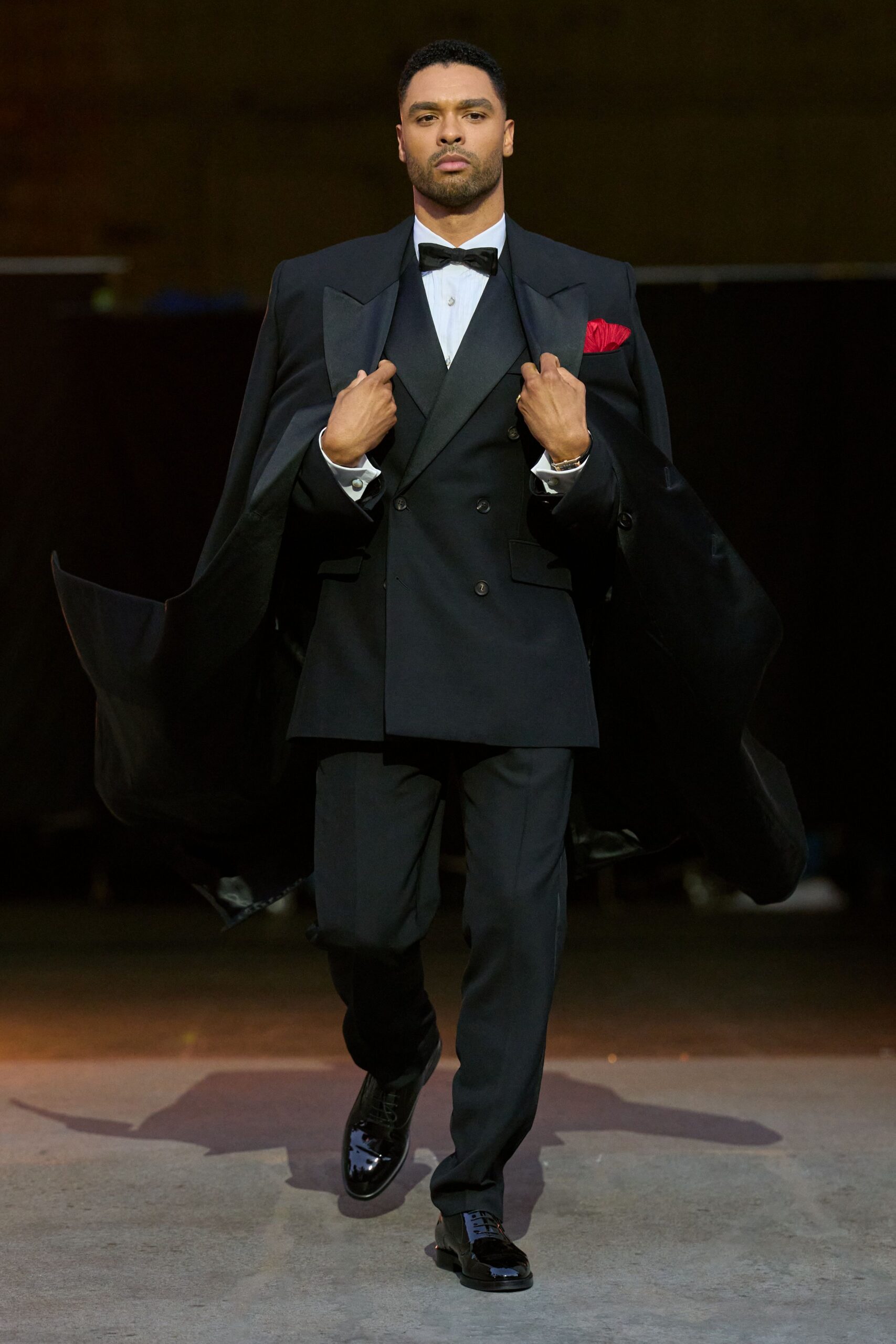 black tailored suit with cape