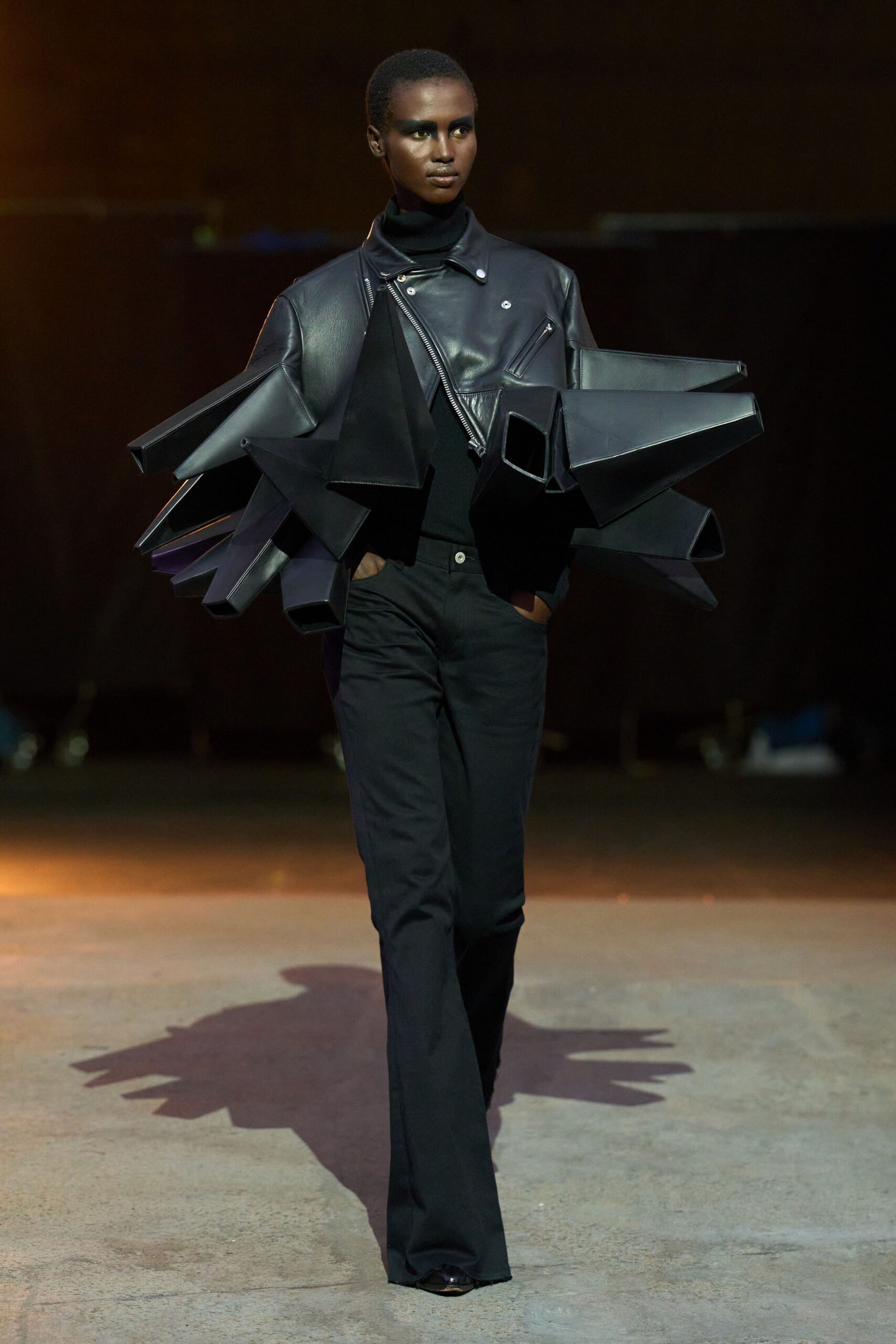 black leather long-sleeve collared fitted layered jacket