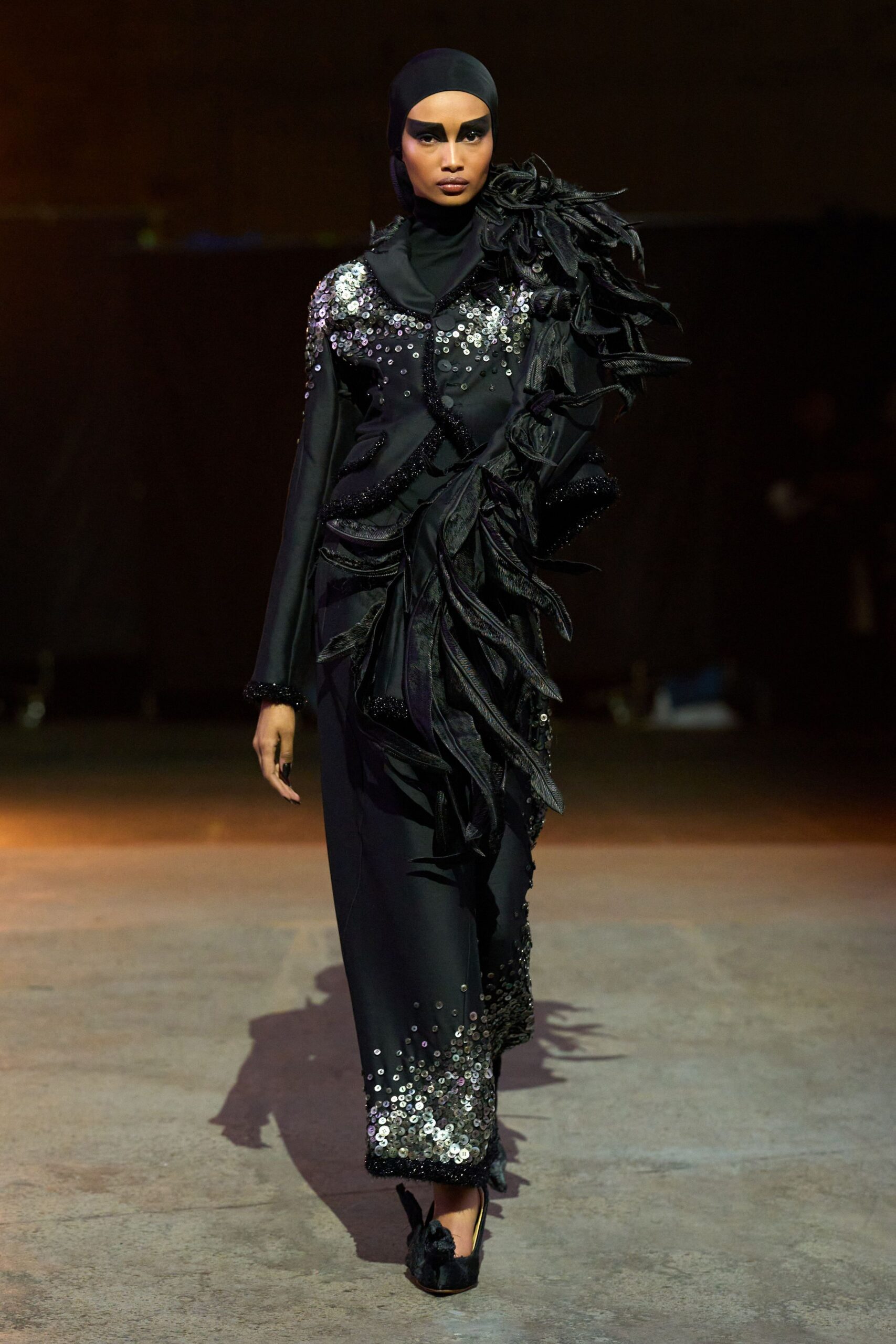 black silk fitted gown with embellishments