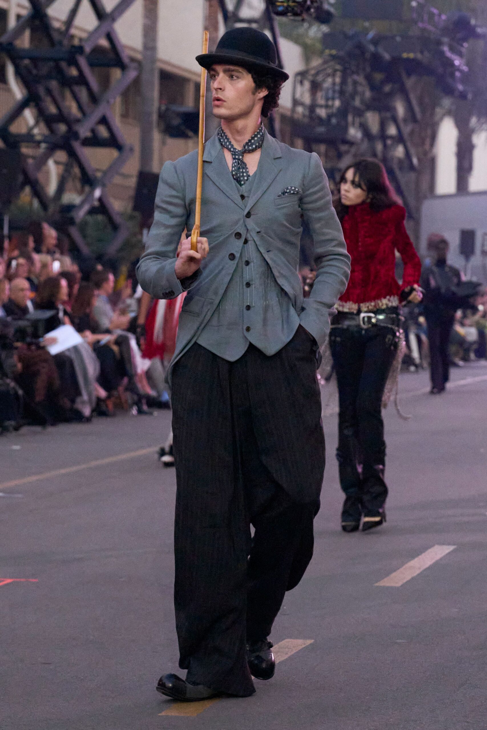 gray tailored blazer with black pants