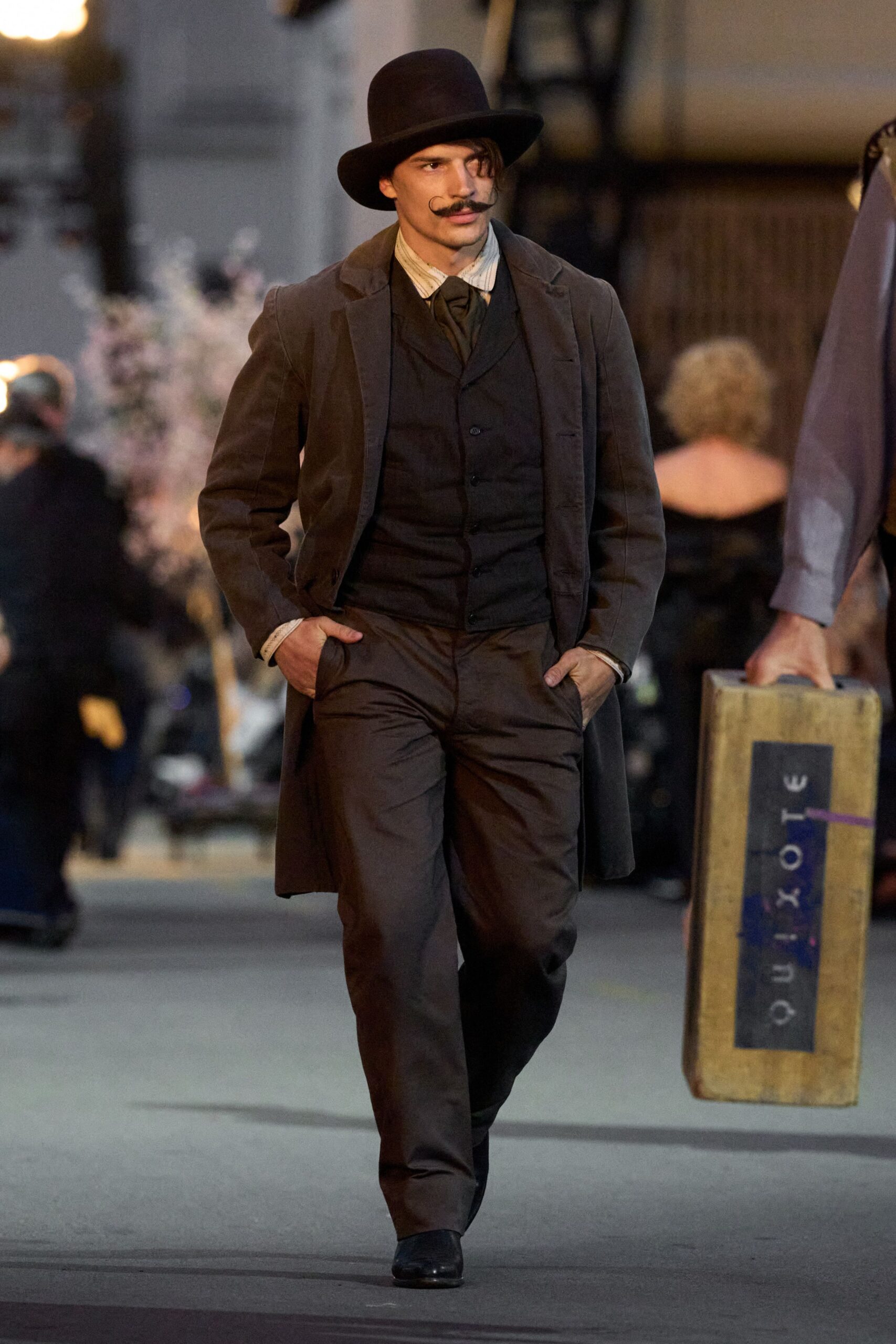 black wool long-sleeve collared structured buttoned coat