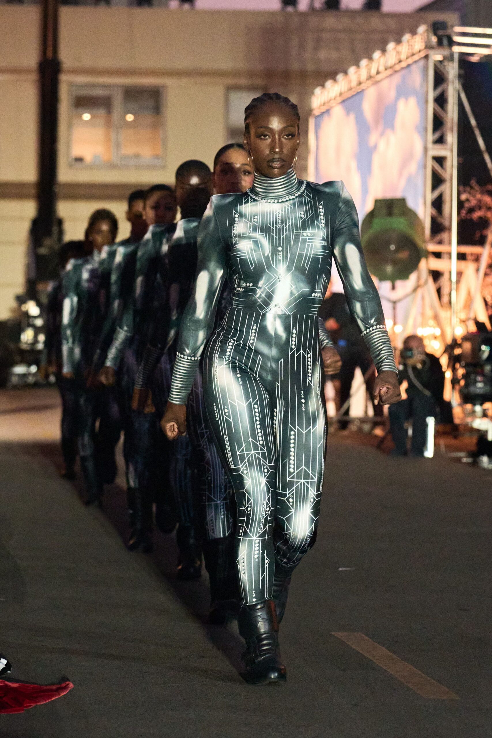 black vinyl long-sleeve high-neck fitted printed catsuit