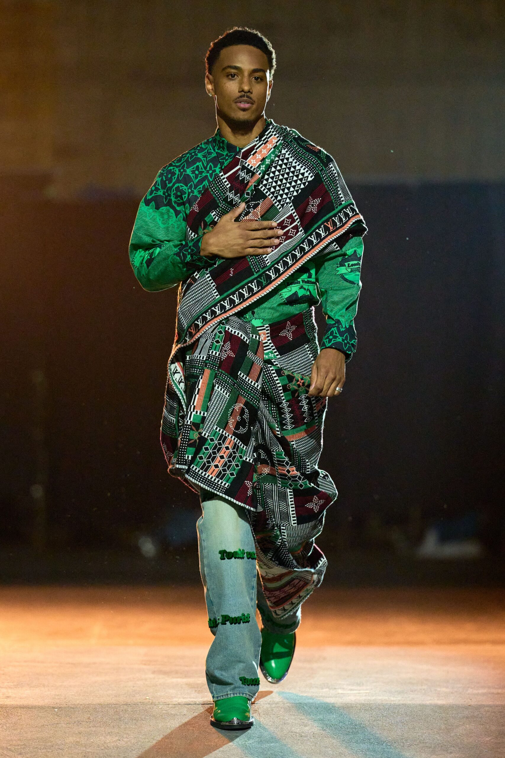 green printed shirt and blue pants