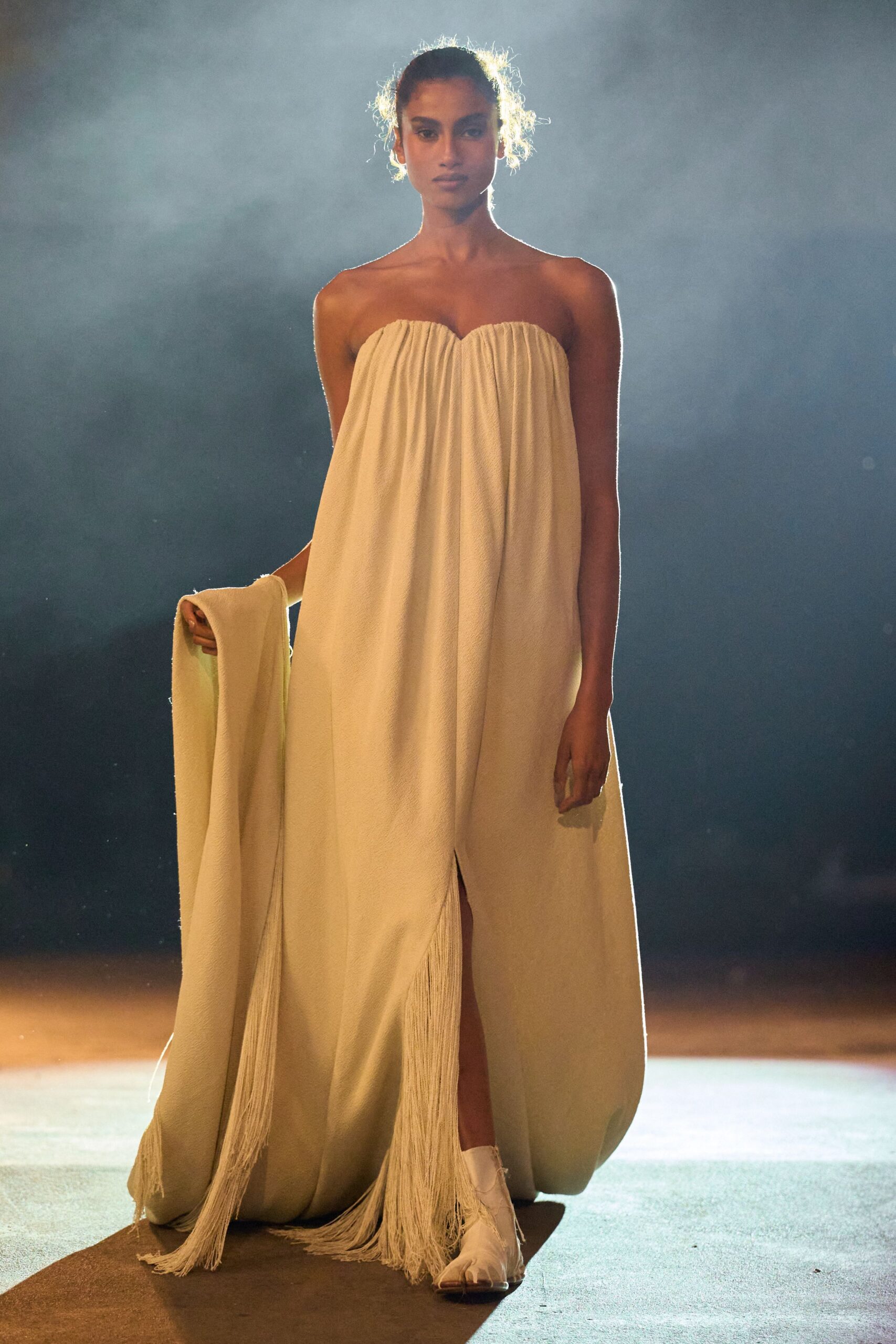 white strapless fringed gown
