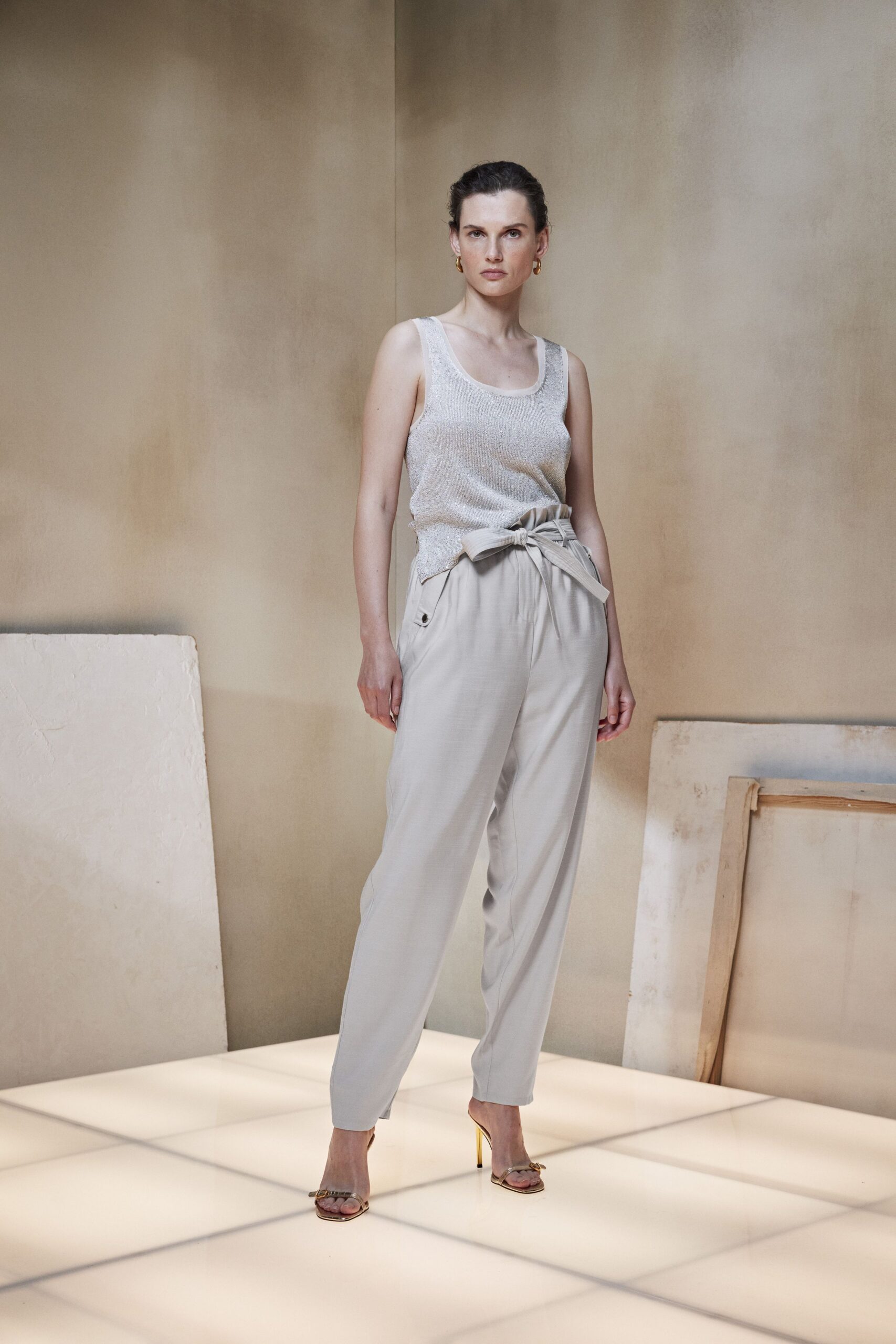 white silk tank-top beige pants