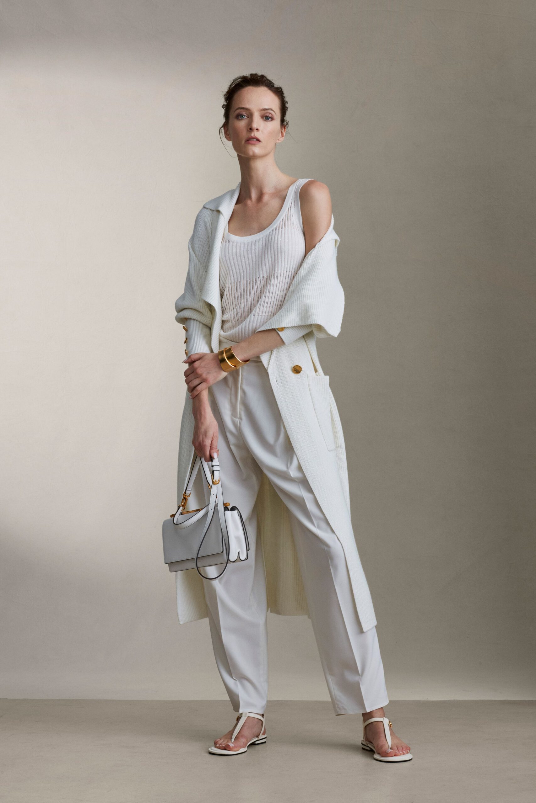 white coat with relaxed pants