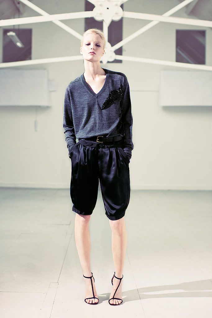 black satin high-waisted pleated shiny short shorts