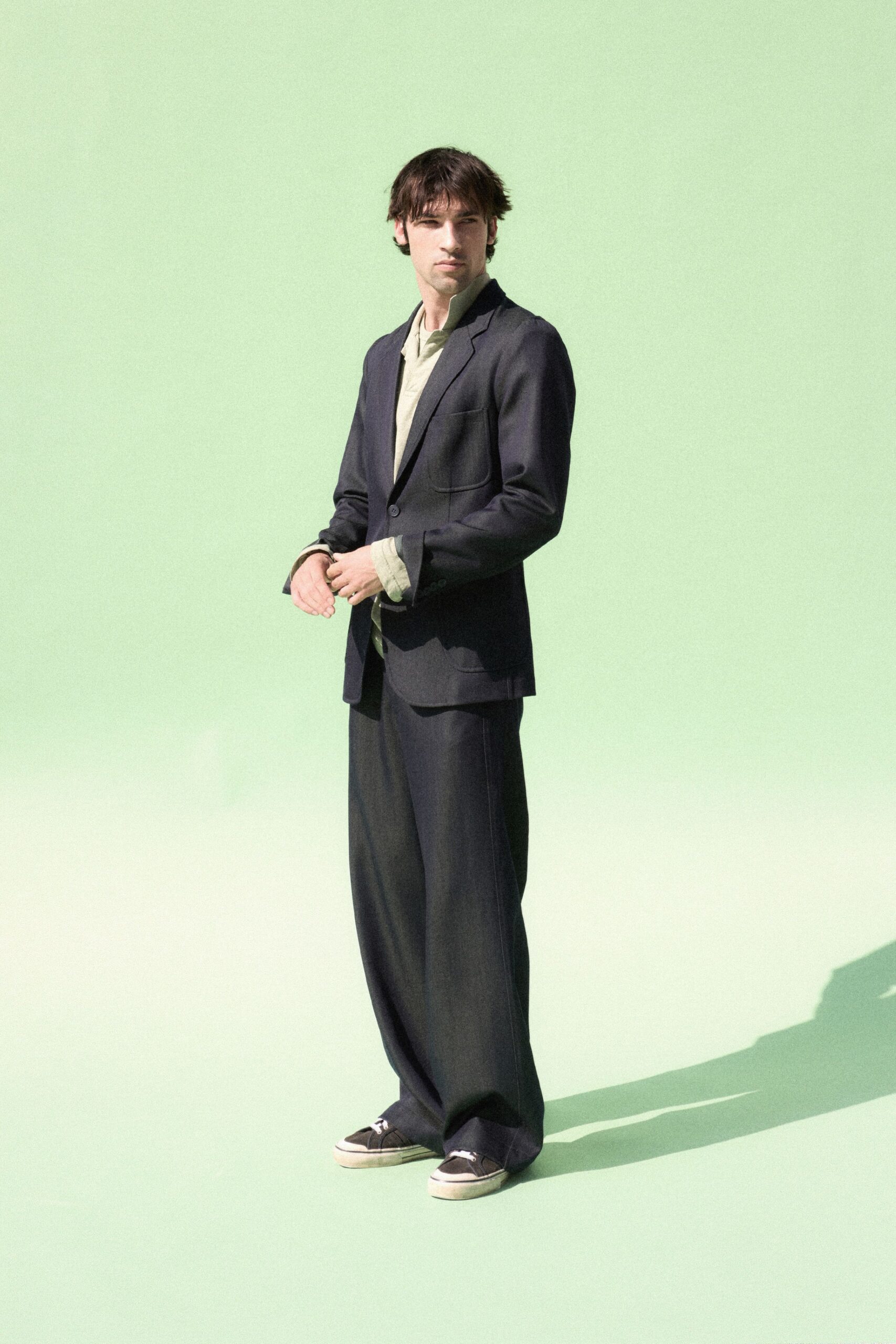 black blazer green shirt relaxed pants