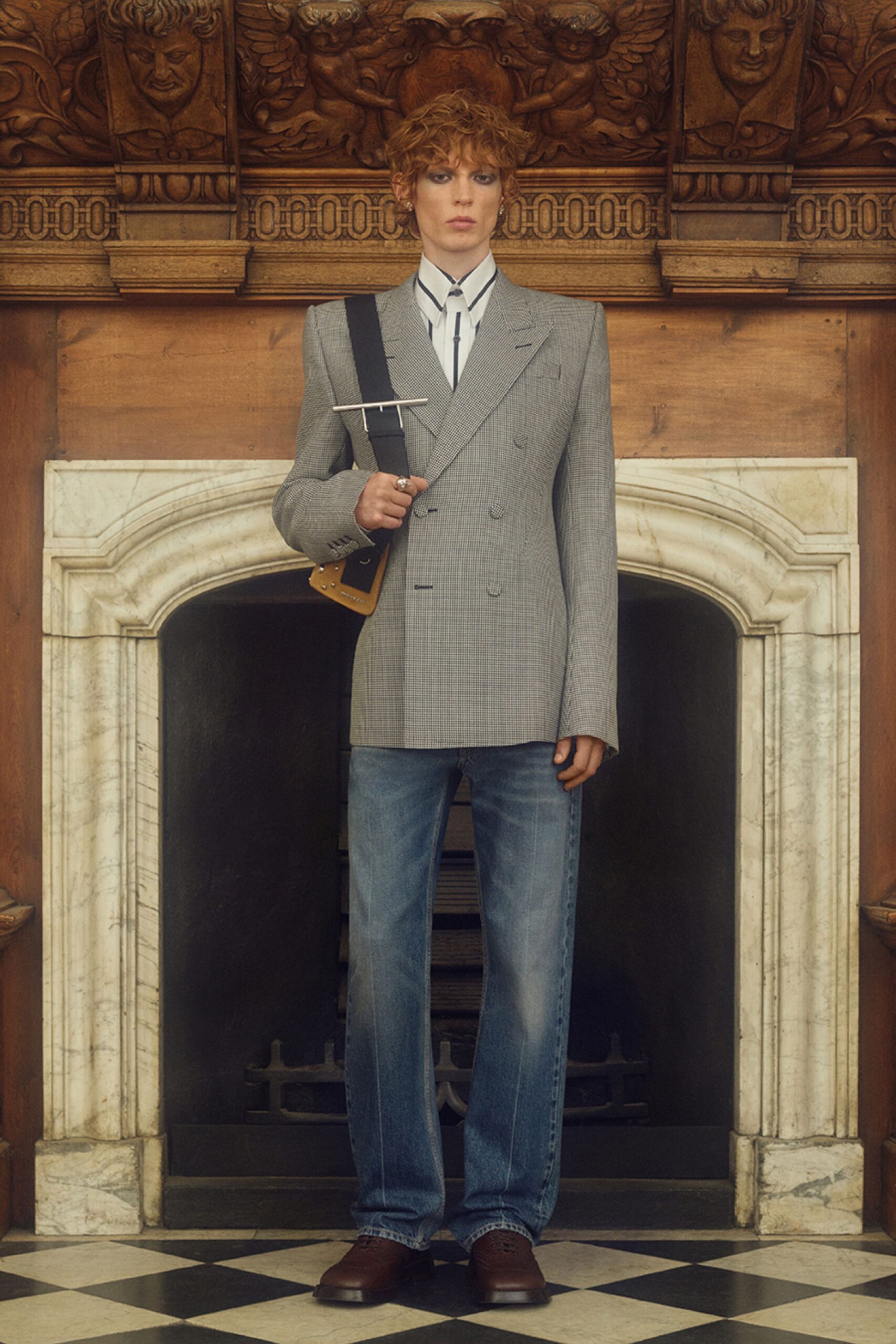 gray tailored blazer with denim pants
