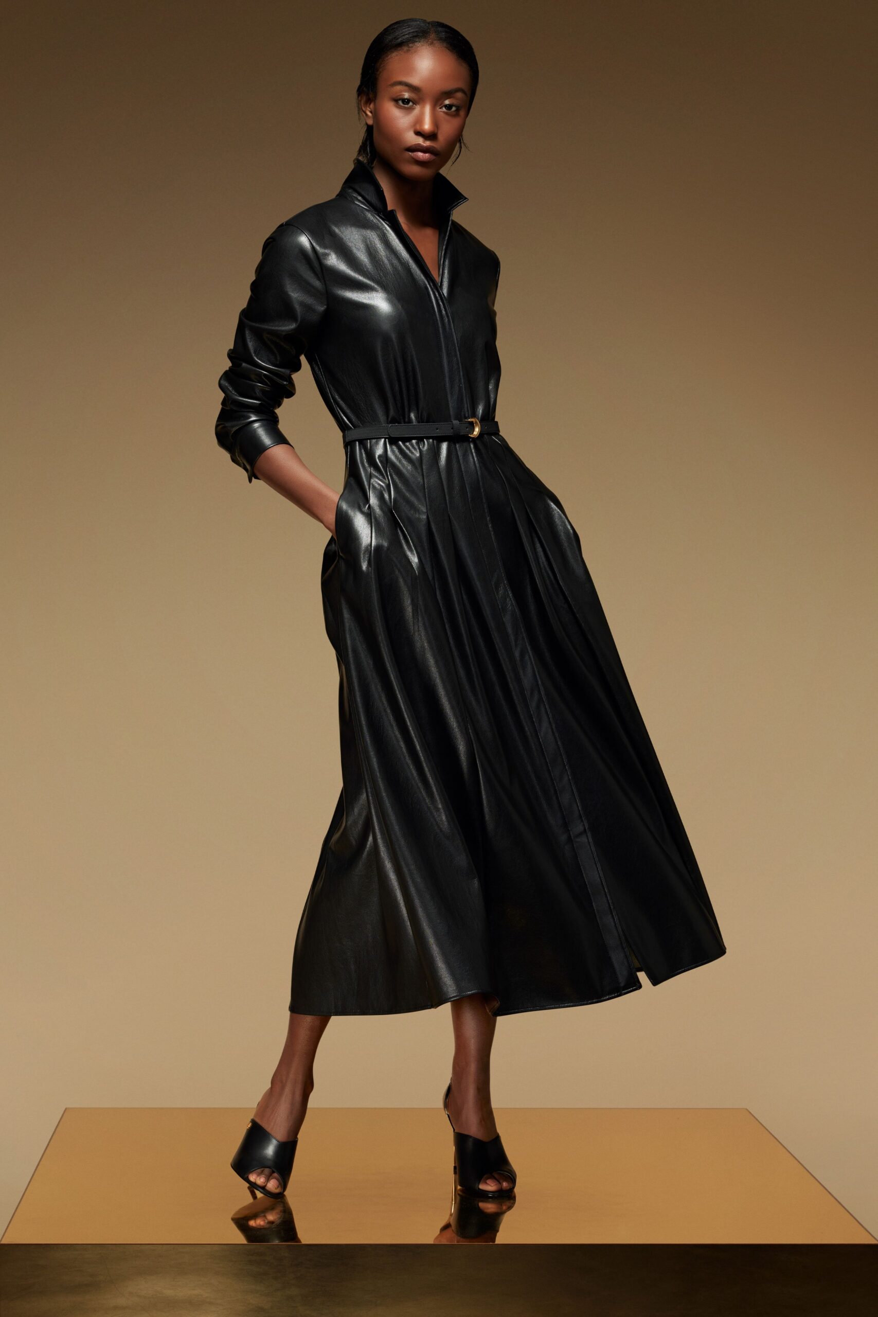 black leather long-sleeve collared fitted pleated belted dress