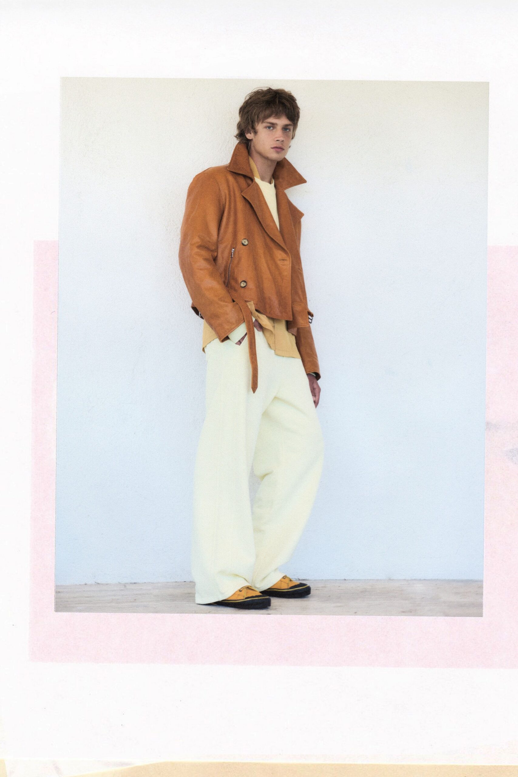 brown leather jacket with yellow shirt