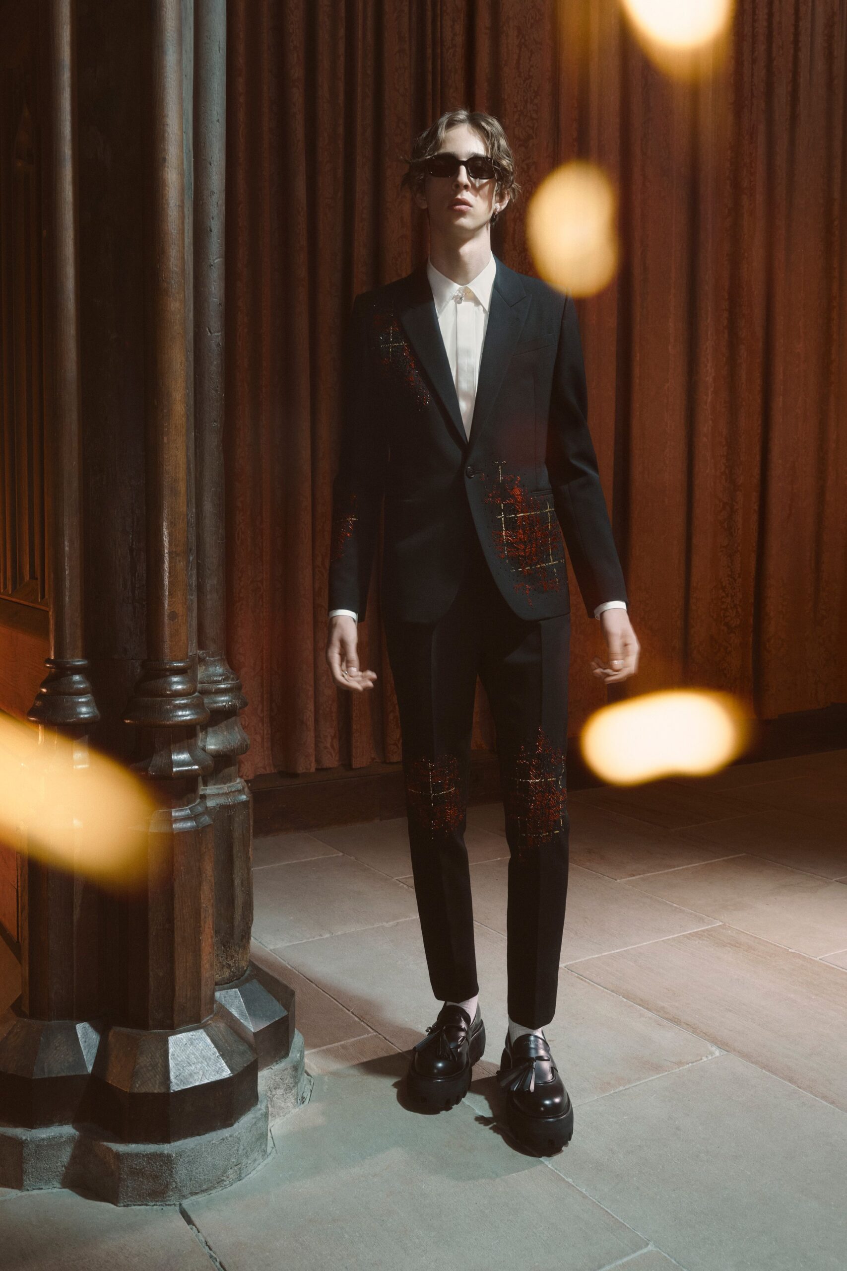 black tailored suit with white shirt