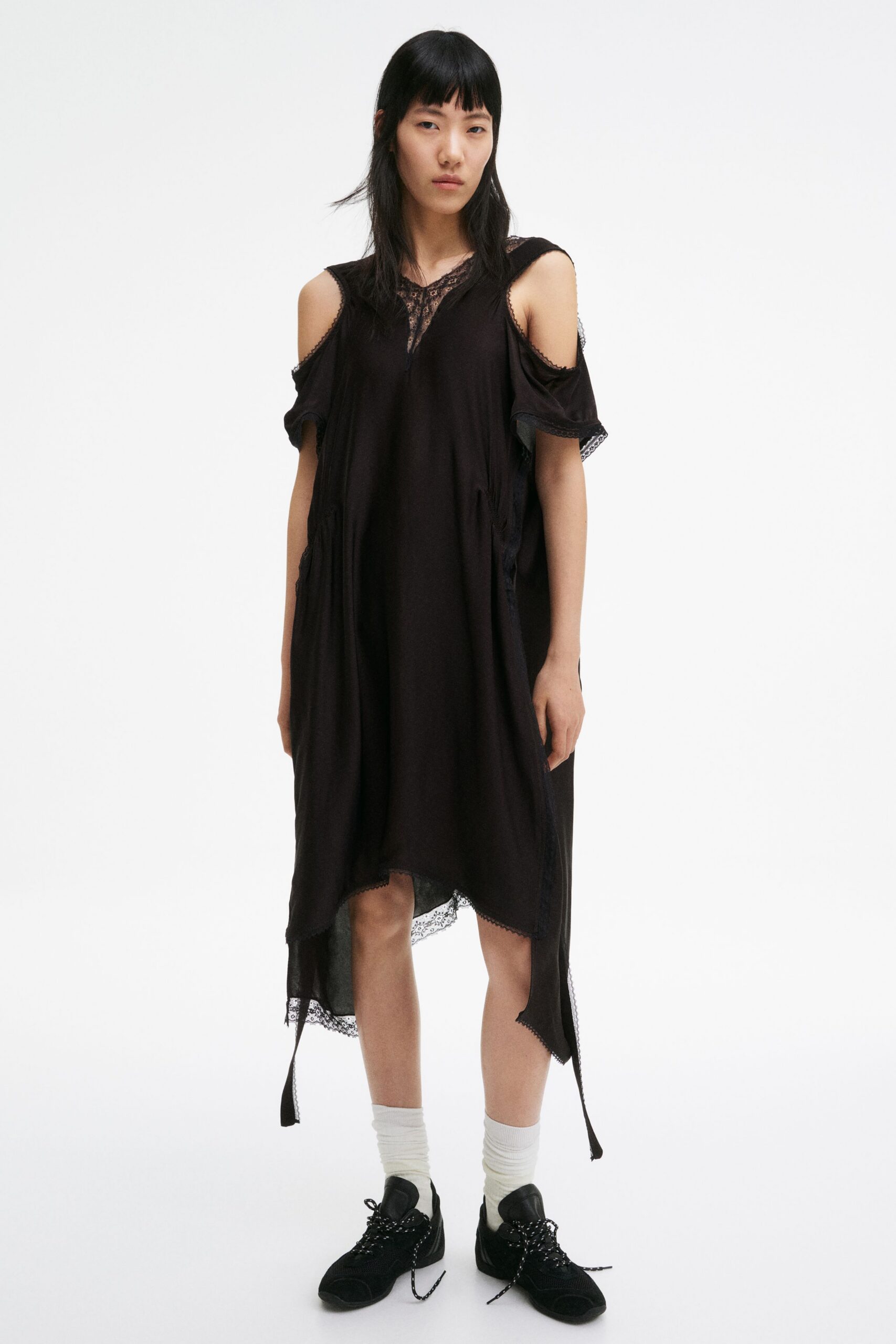 black relaxed midi dress with layered details