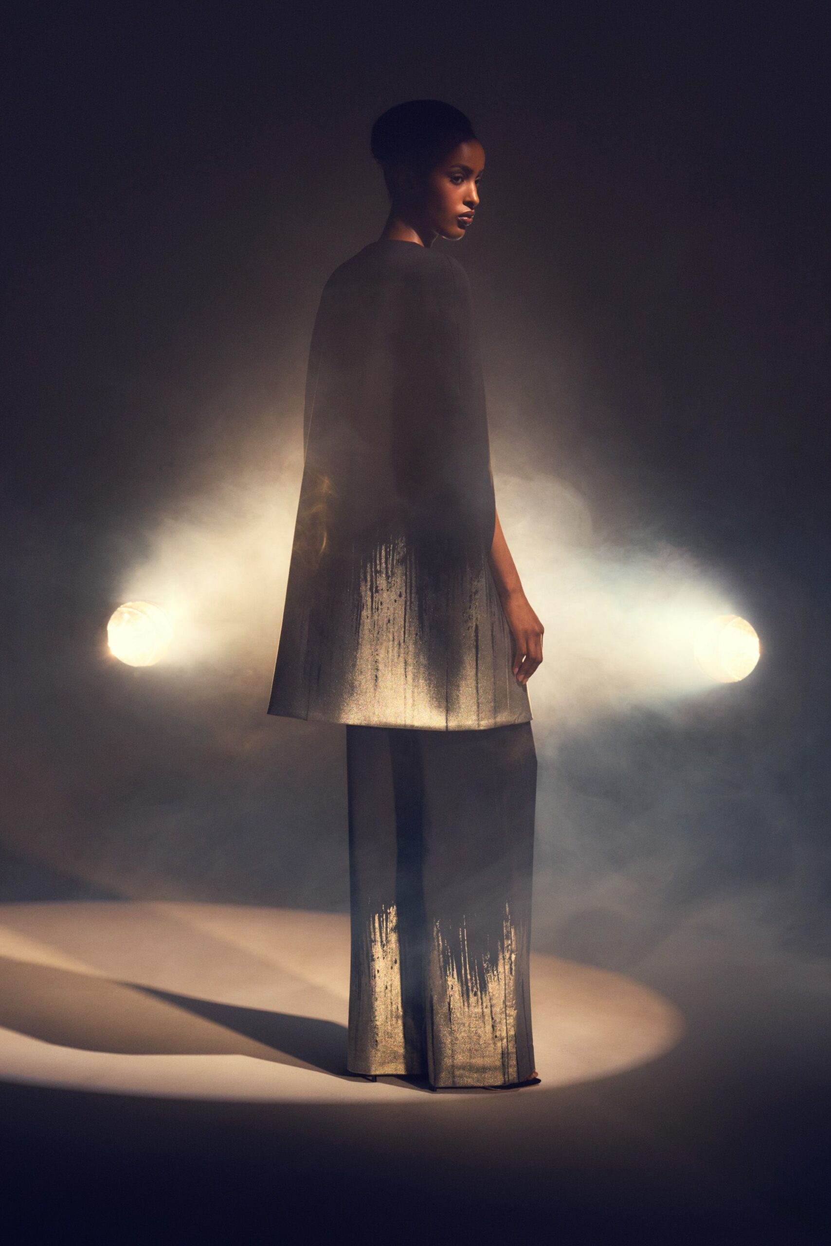 black and gold silk cape and pants