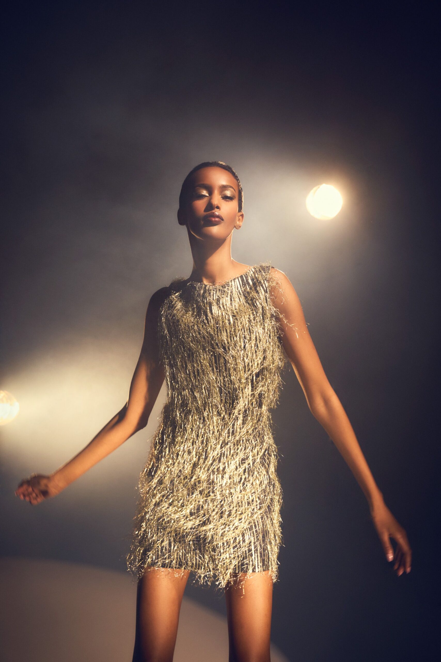 gold fringed sleeveless mini dress