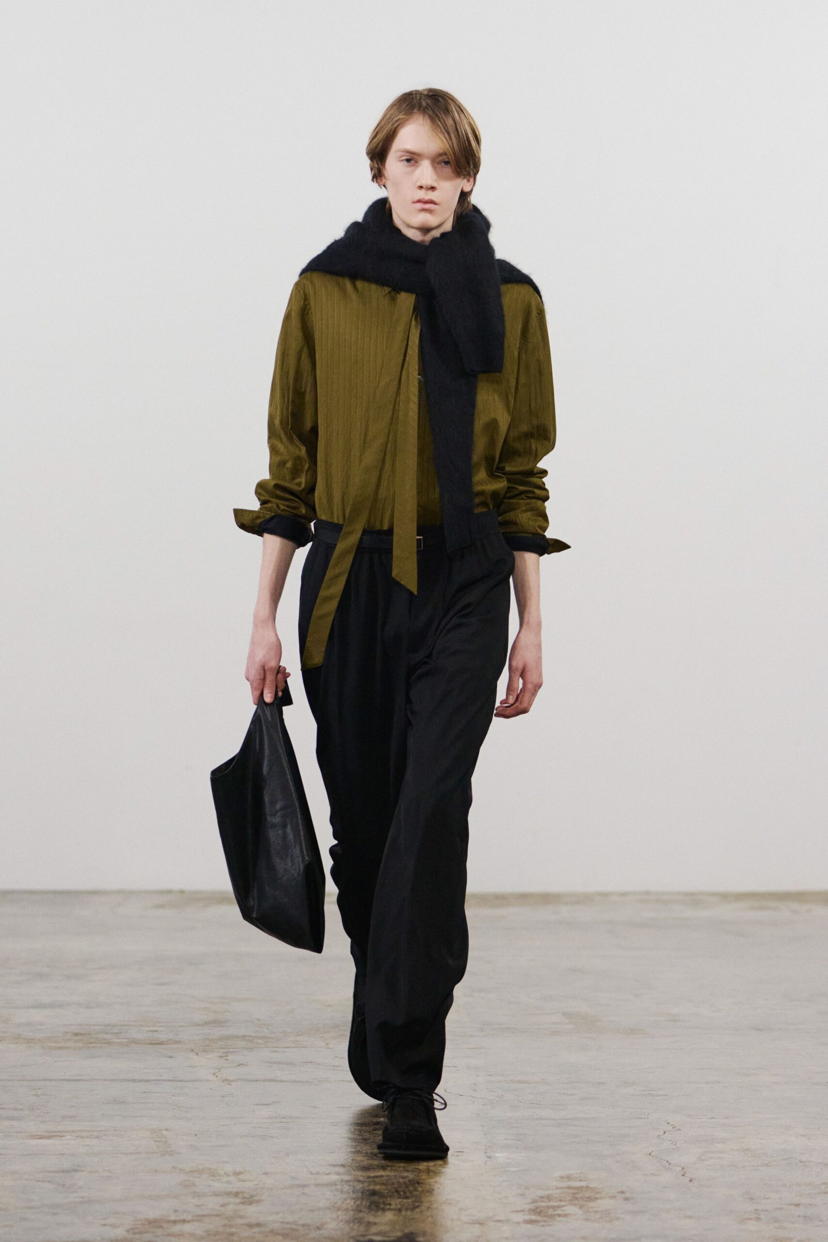 green relaxed shirt with black pants