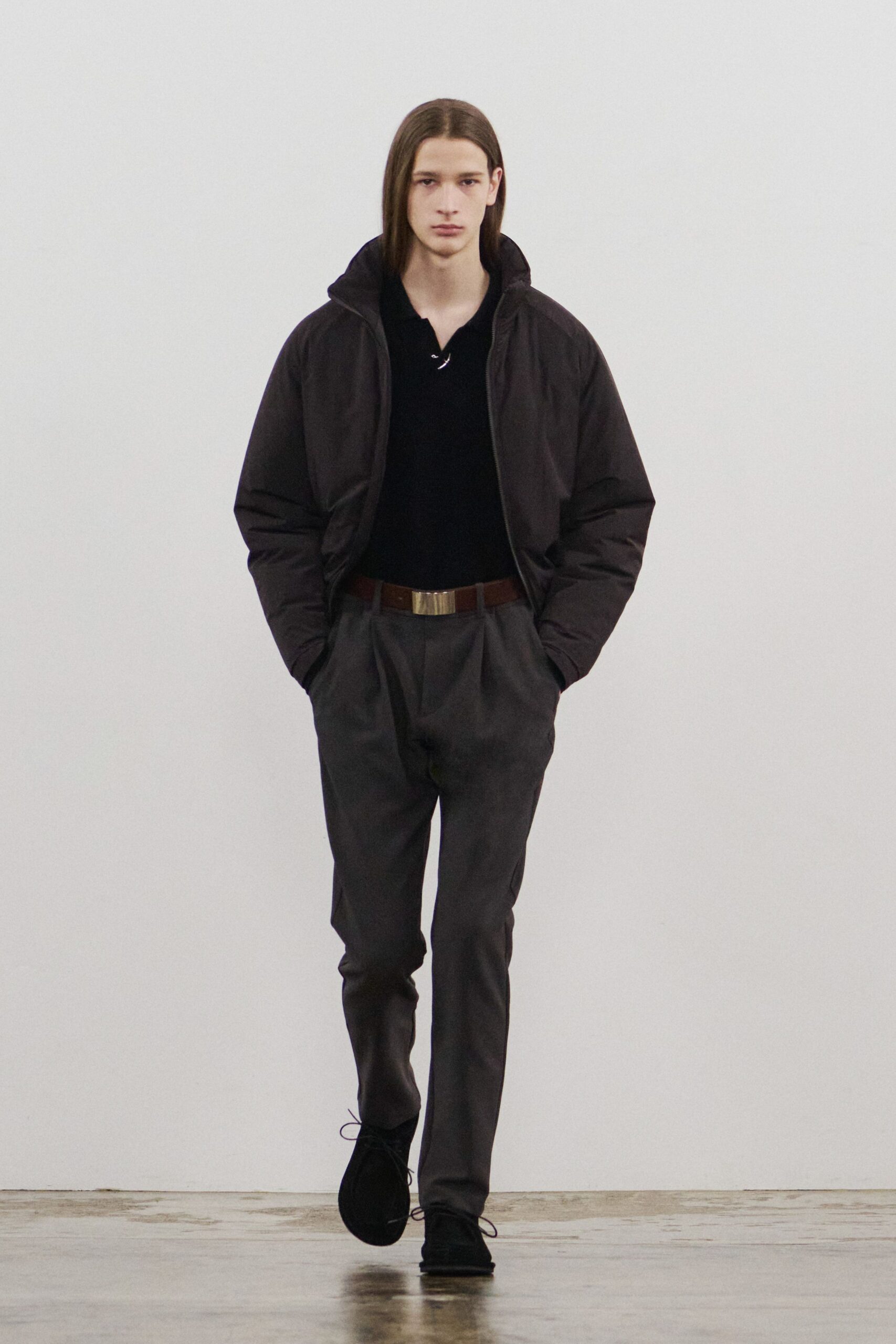 black relaxed jacket with gray tailored pants