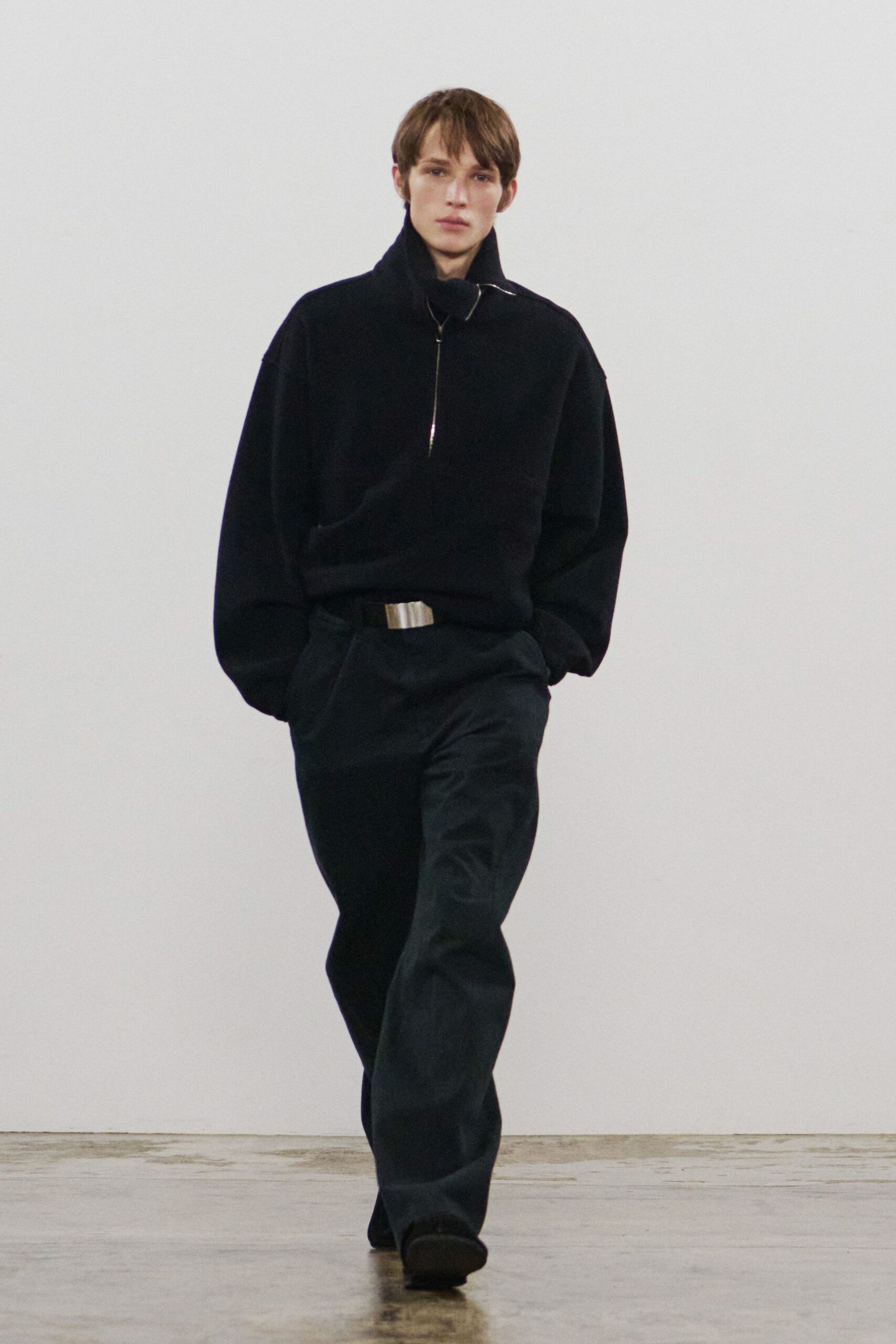 black relaxed sweater and pants