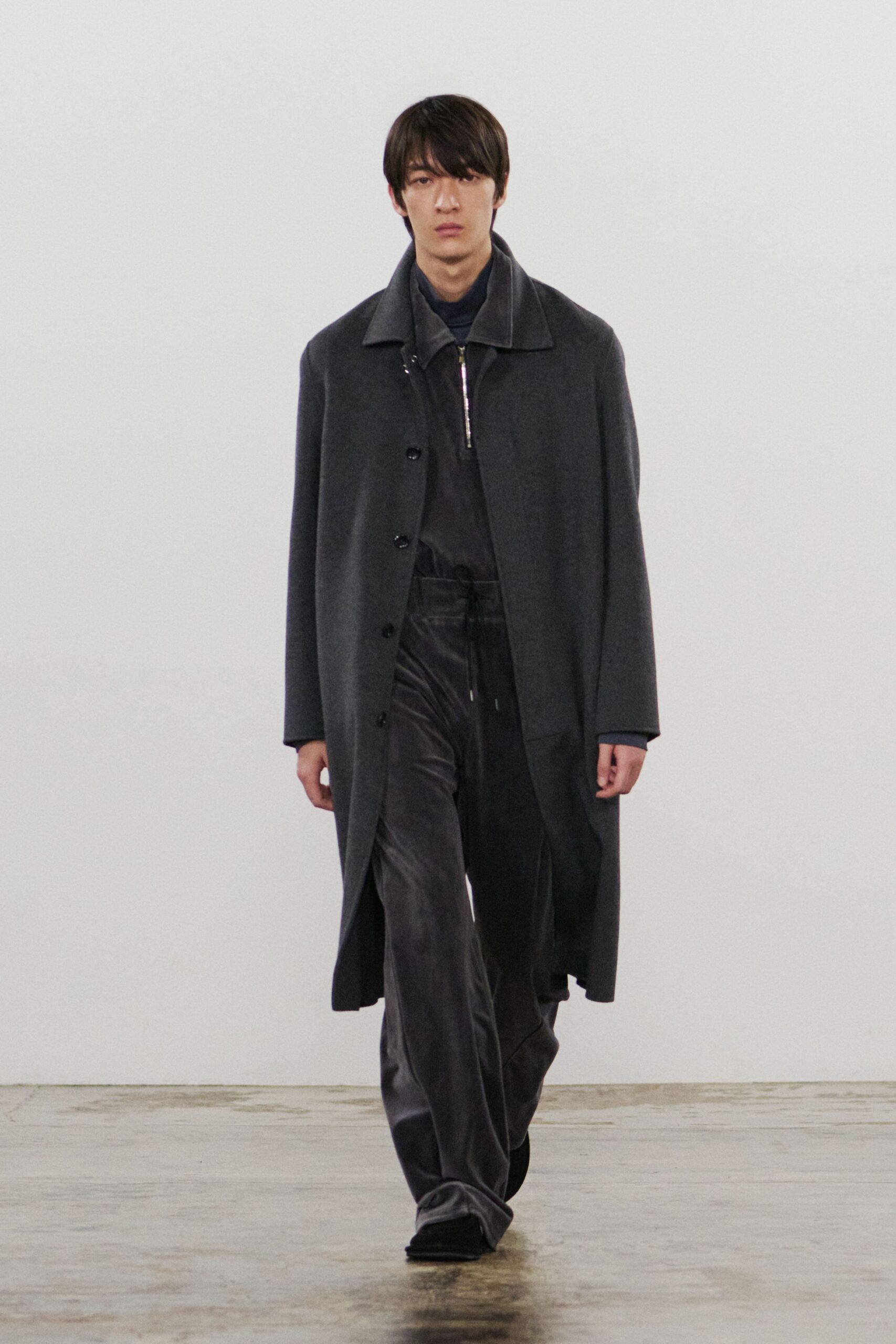 gray wool coat and black velvet pants