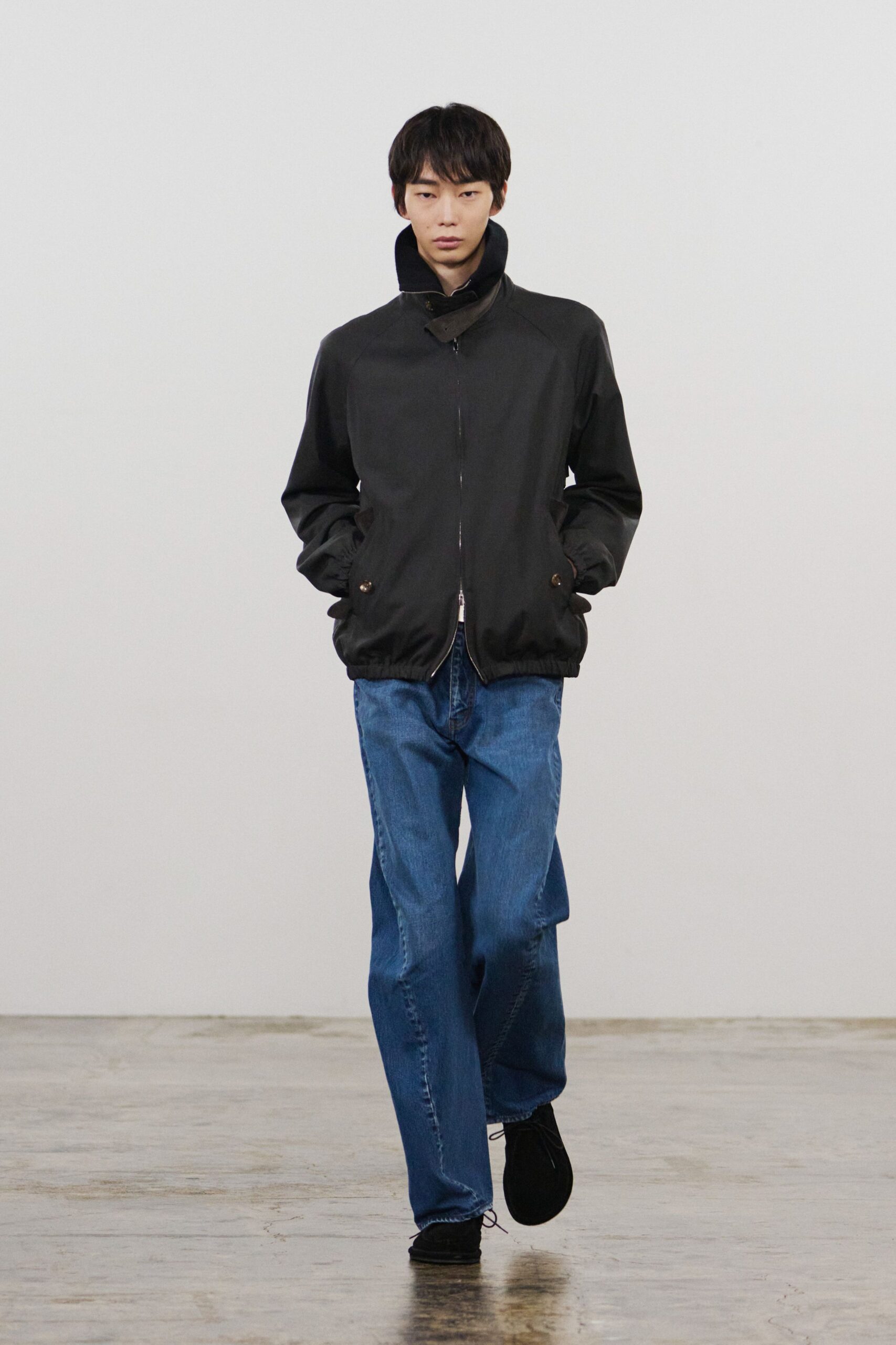 black relaxed jacket with blue jeans