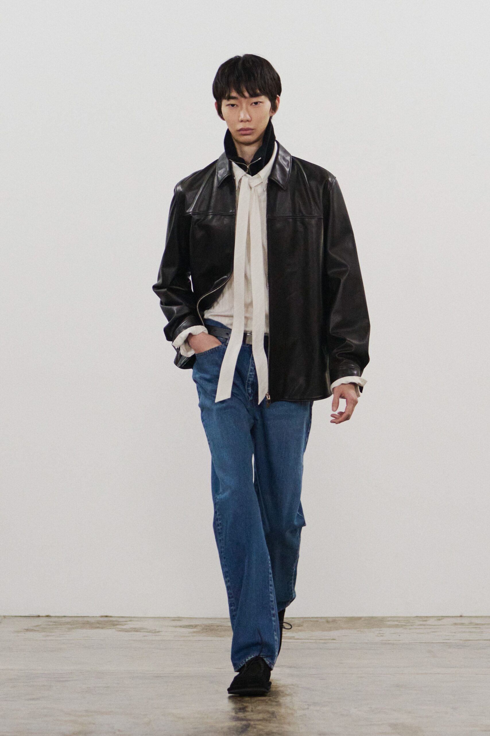 black leather long-sleeve collared oversized jacket
