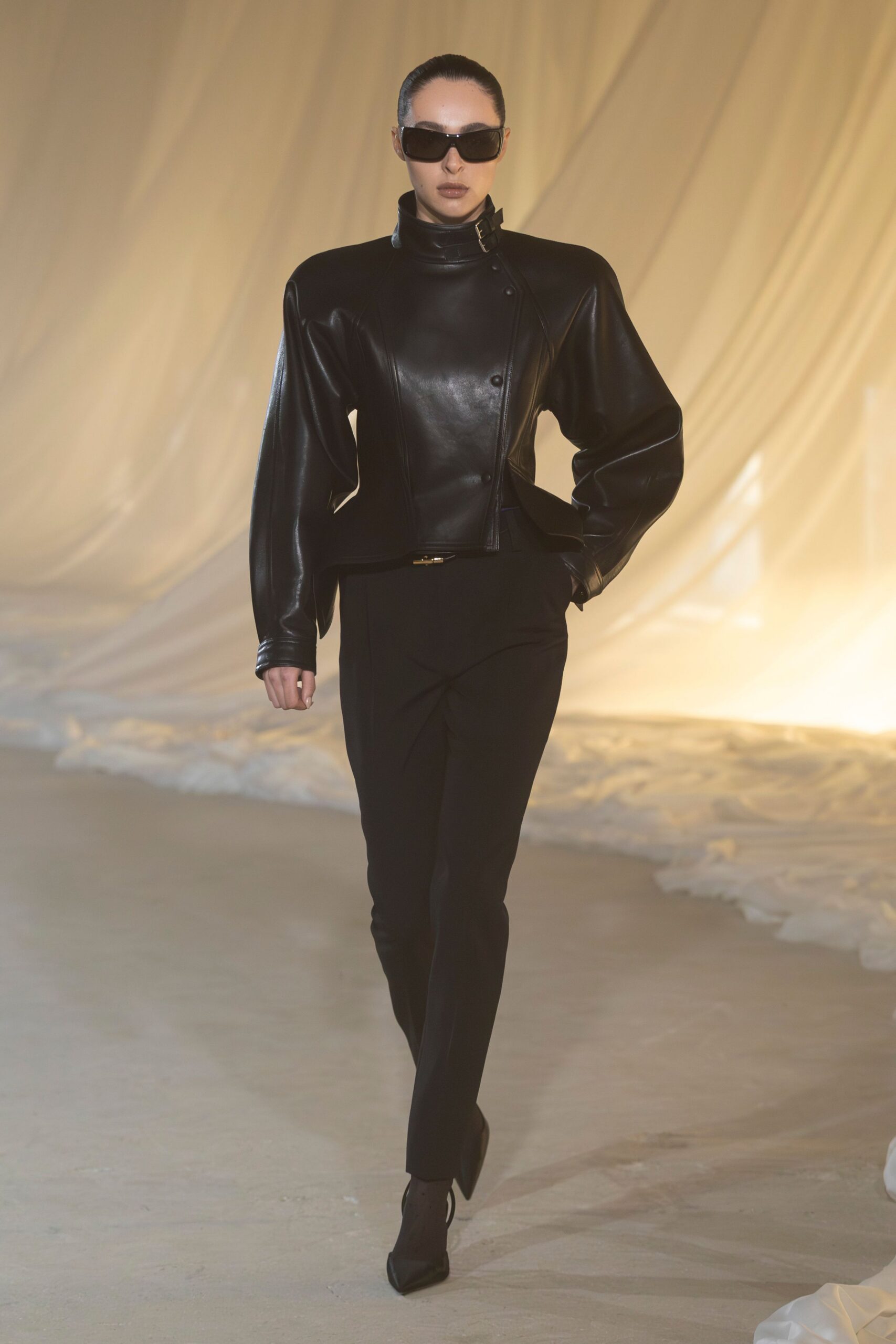 black leather fitted jacket with slim pants