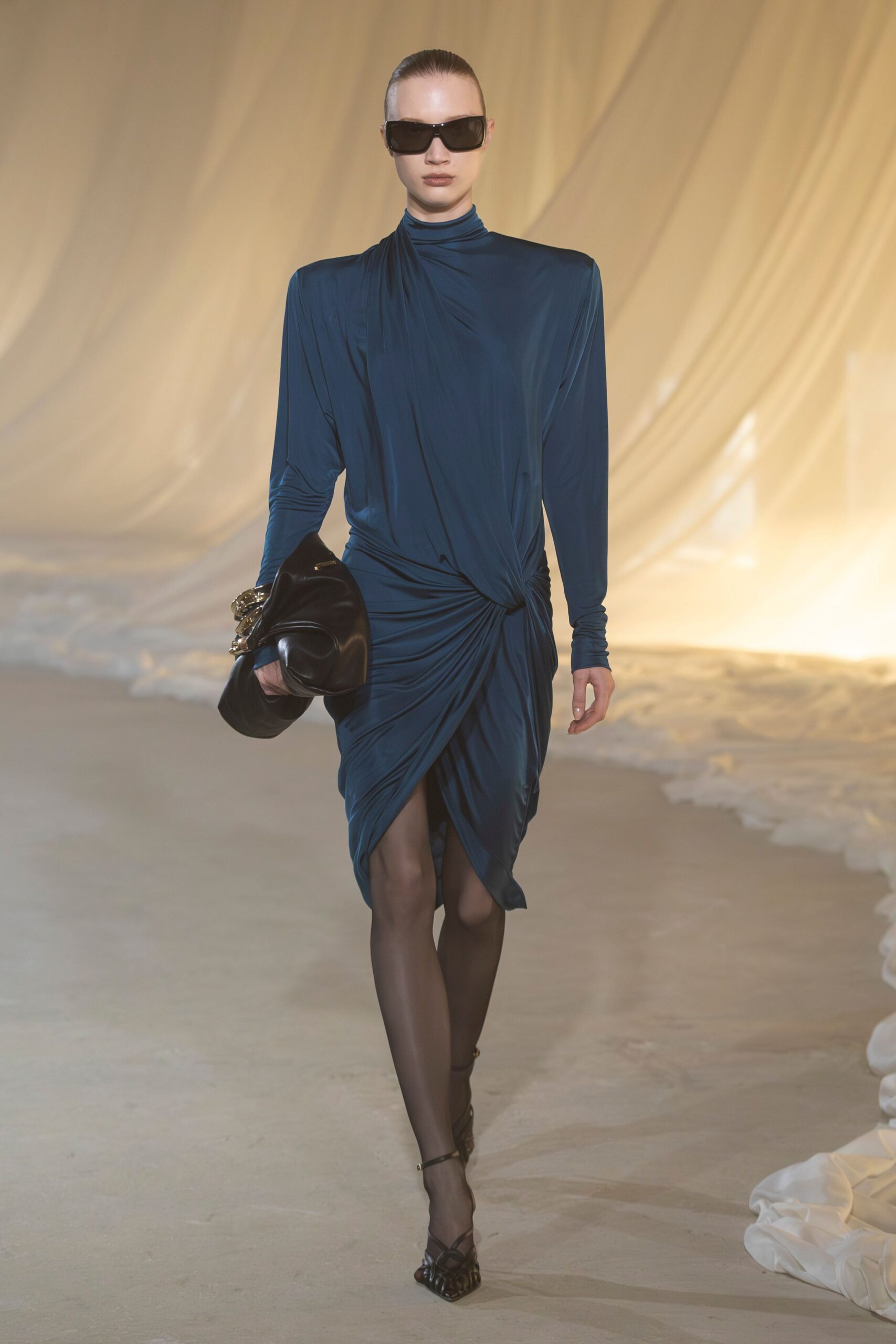 blue silk long-sleeve high-neck fitted draped flowing dress