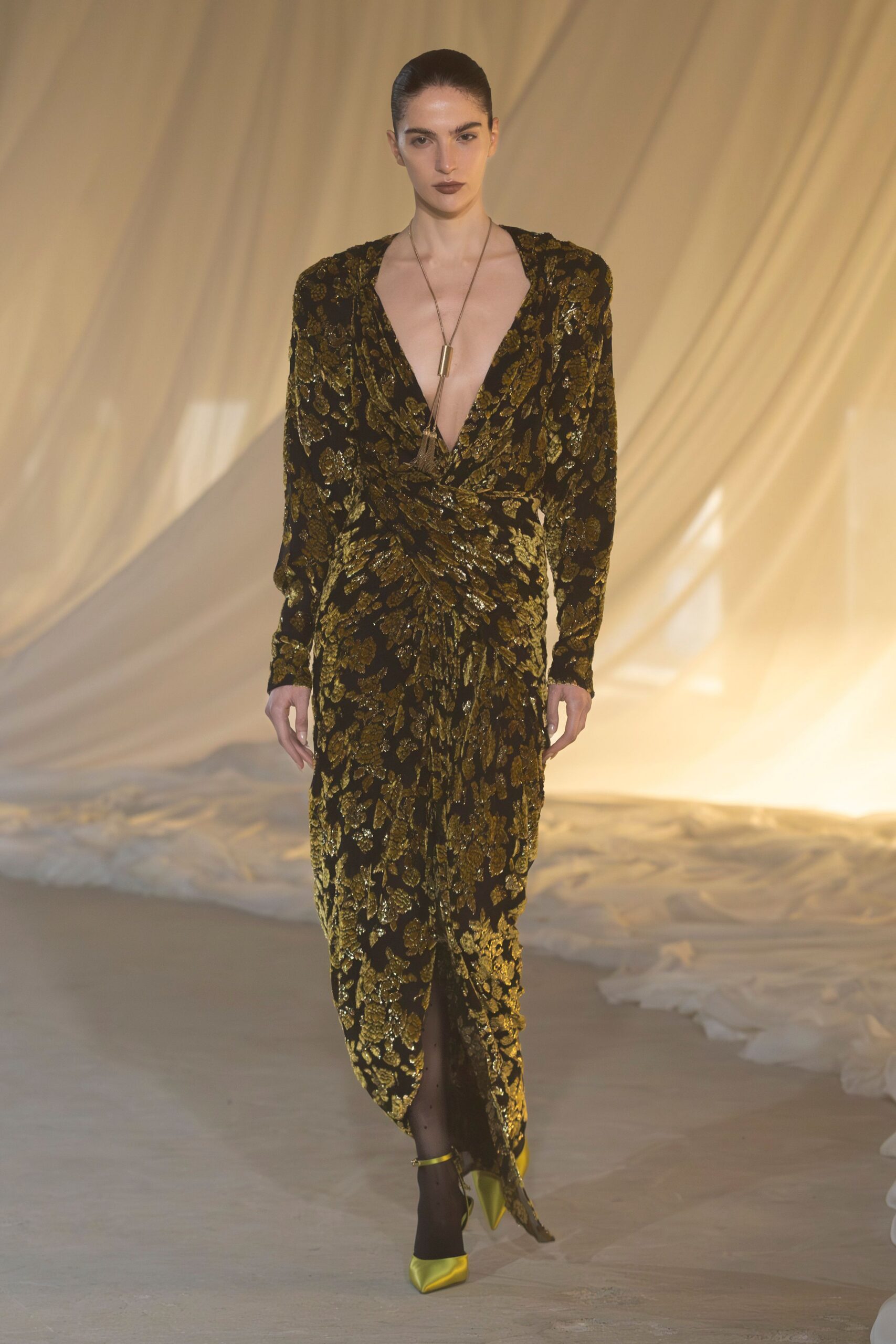 black and gold velvet gown with heels