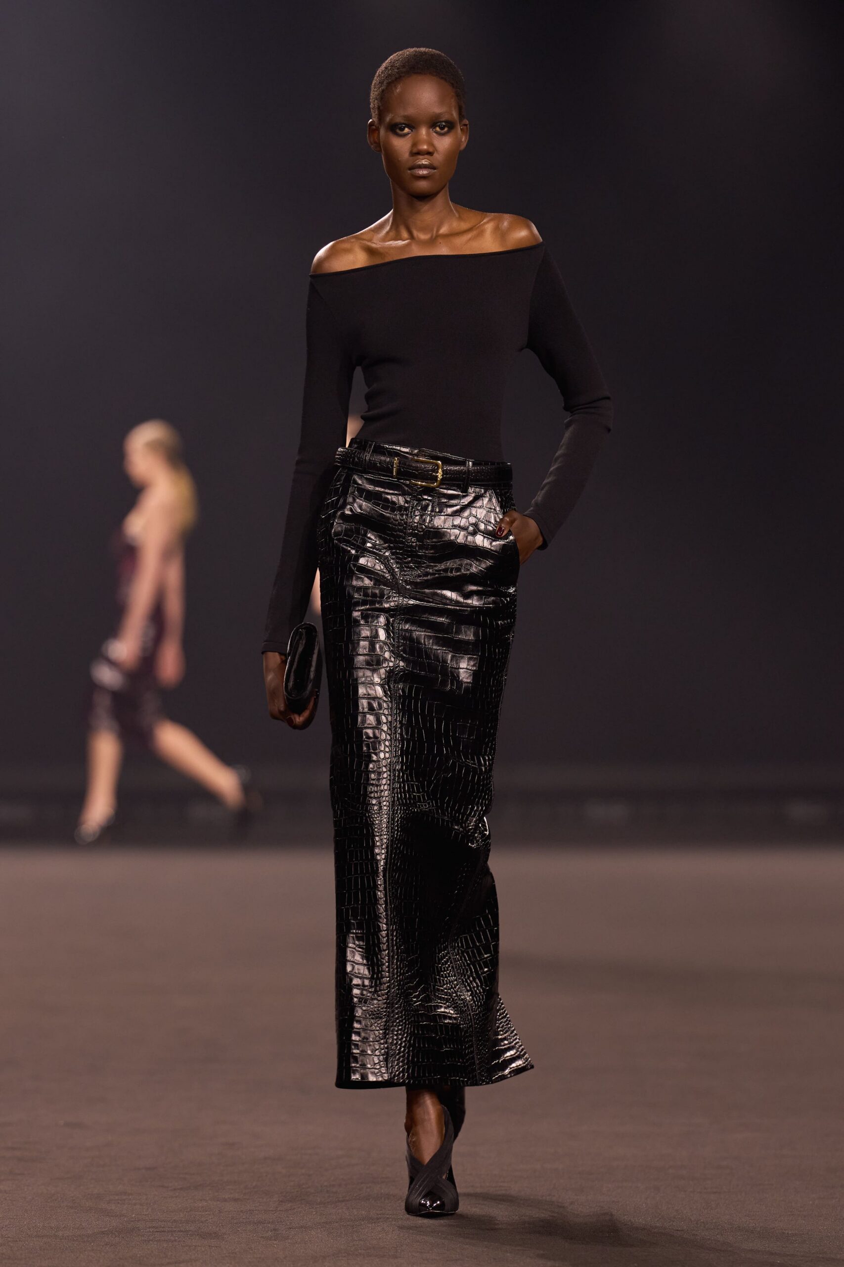 black off-shoulder top and leather skirt