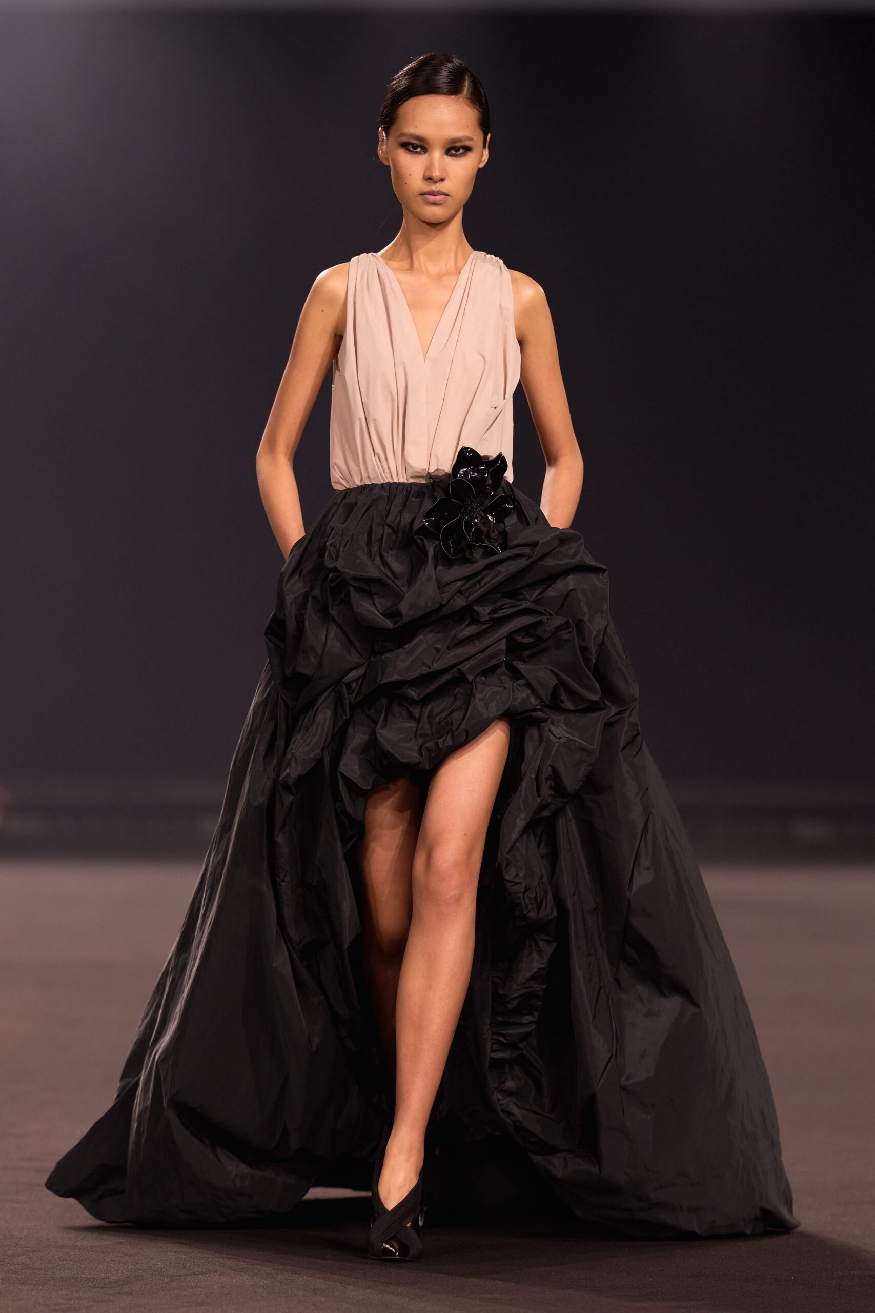 black silk sleeveless v-neck fitted pleated layered gown