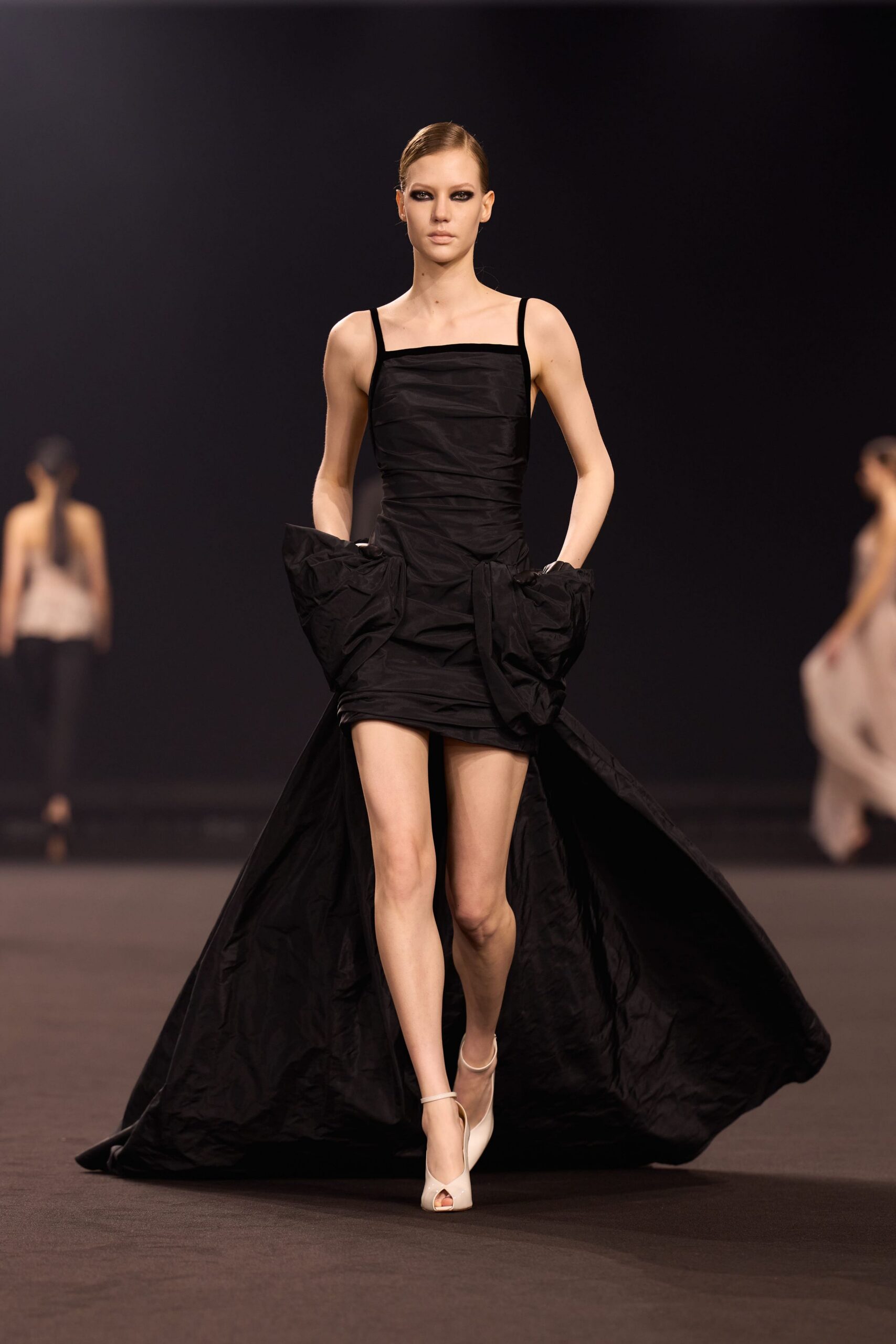 black pleated midi dress with white shoes