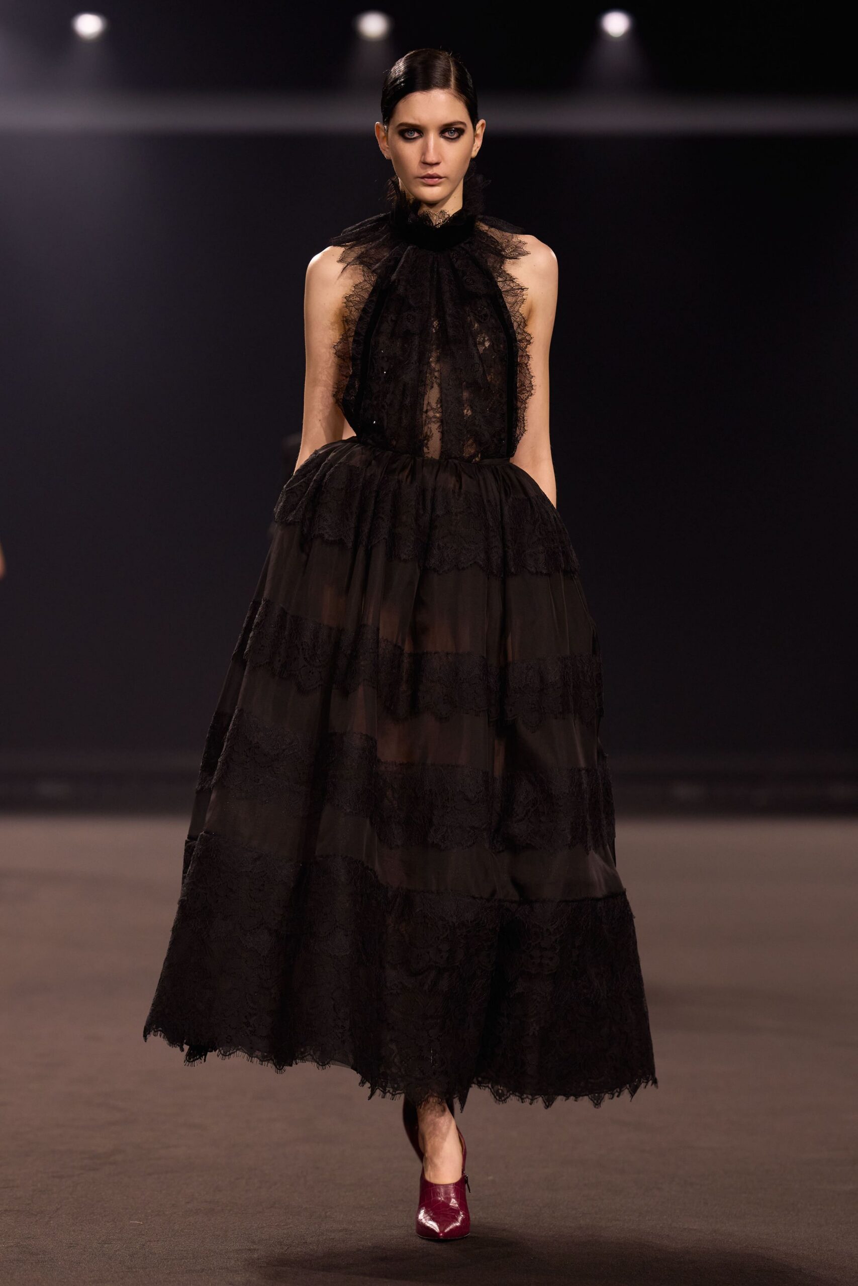 black lace sleeveless high-neck fitted layered pleated gown