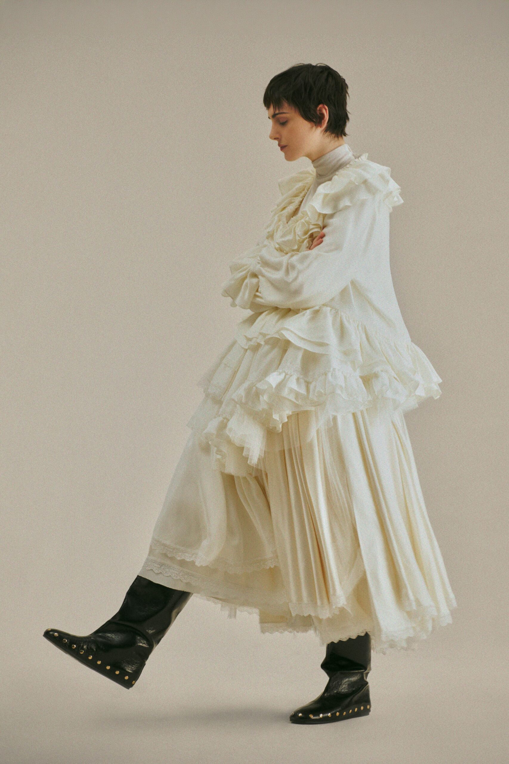 white ruffled midi dress with black boots