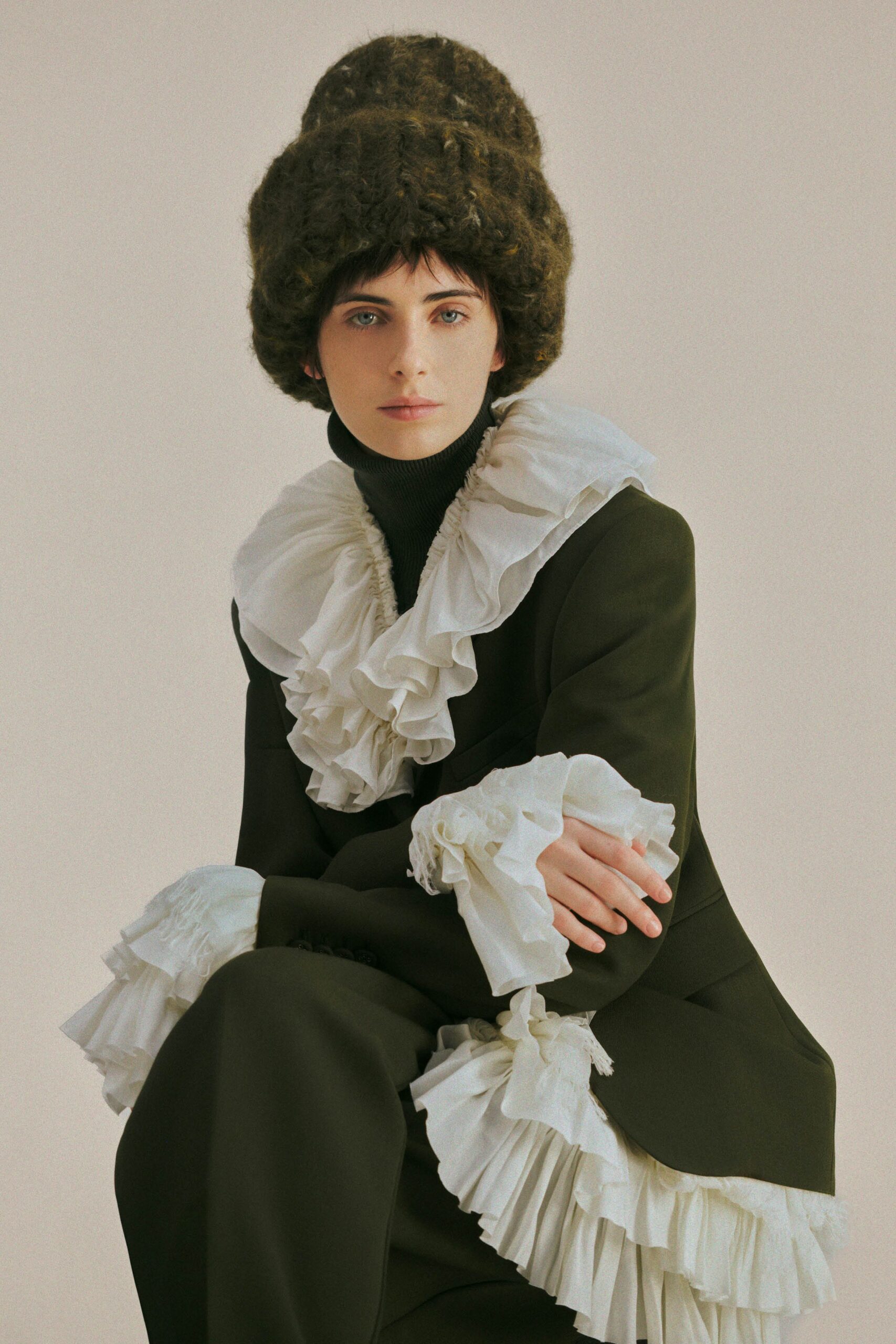 black wool long-sleeve collared fitted ruffled blazer