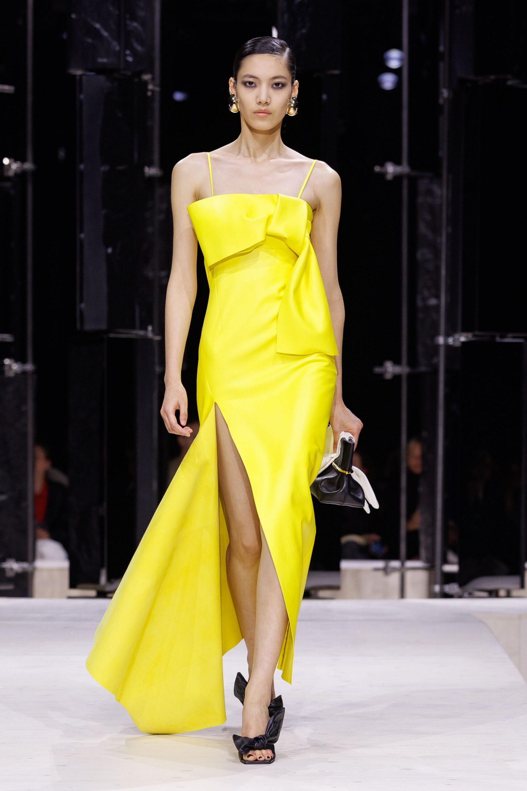 yellow silk sleeveless v-neck fitted draped flowing gown