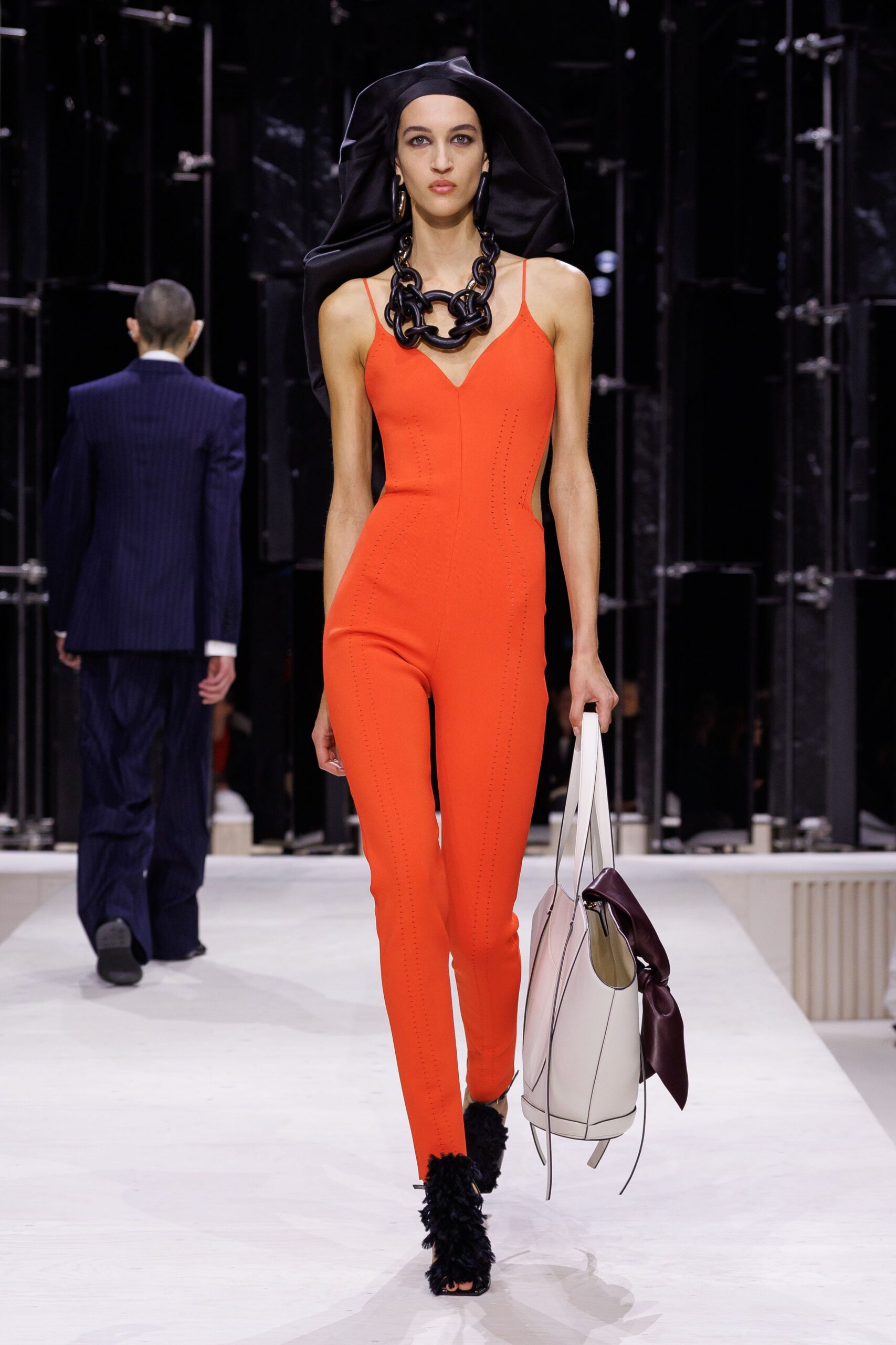 red cotton sleeveless v-neck fitted ruched jumpsuit