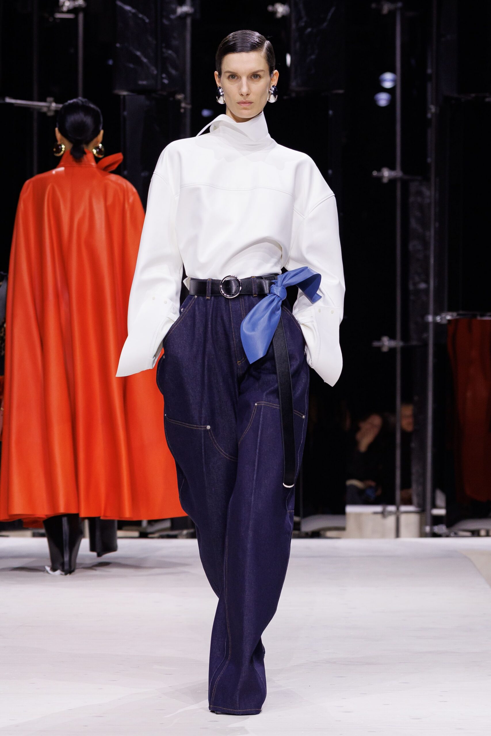 oversized white top with blue pants