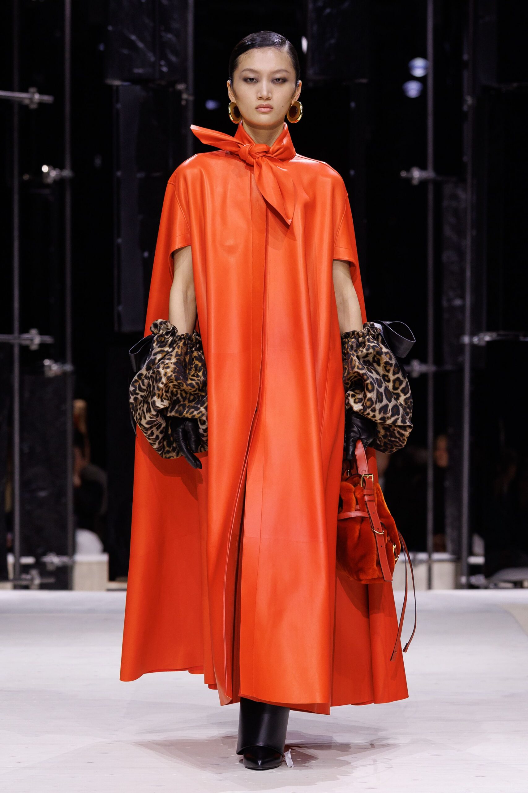 red leather long-sleeve fitted belted maxi cape