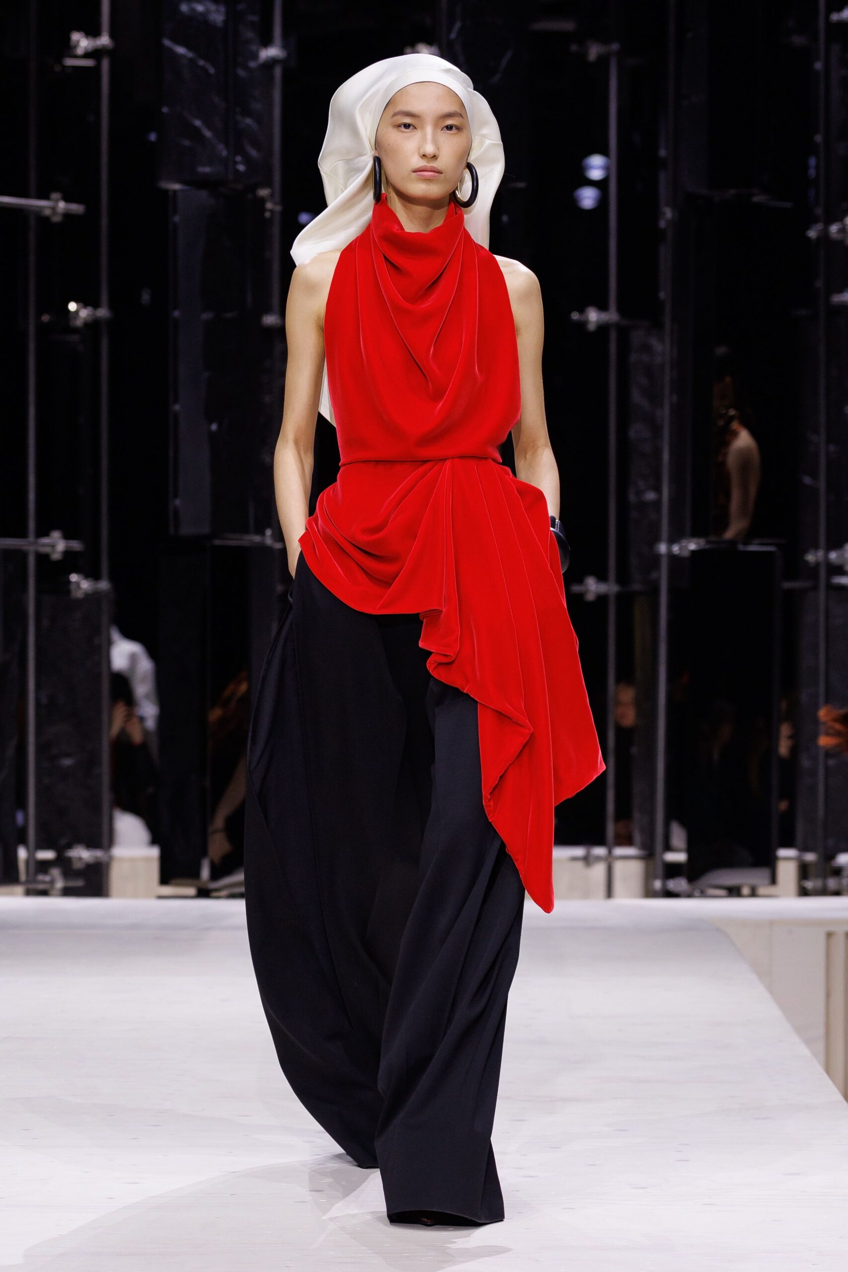 red silk sleeveless high-neck fitted draped top