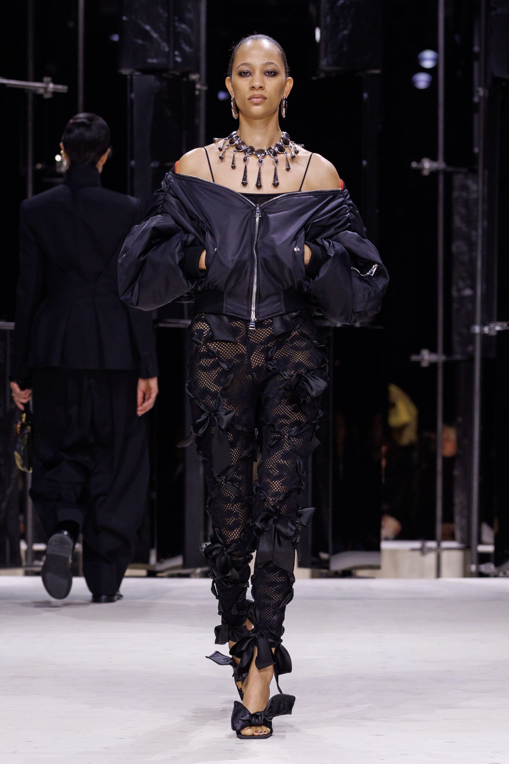 black vinyl long-sleeve fitted zippered ruffled jacket