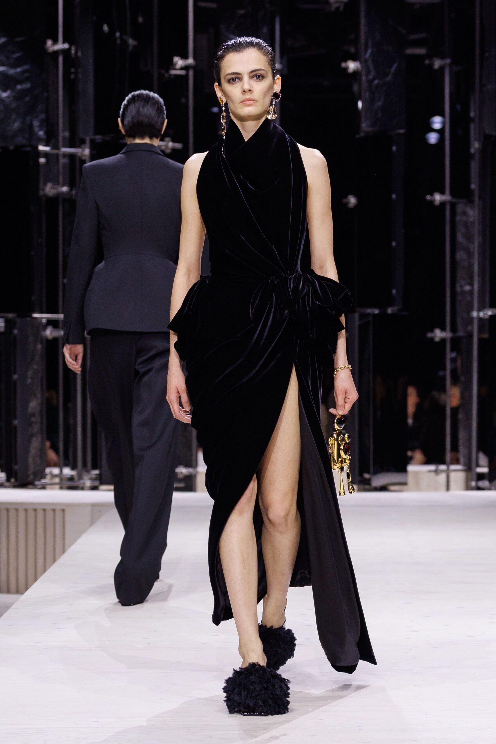 black velvet sleeveless high-neck fitted draped layered gown