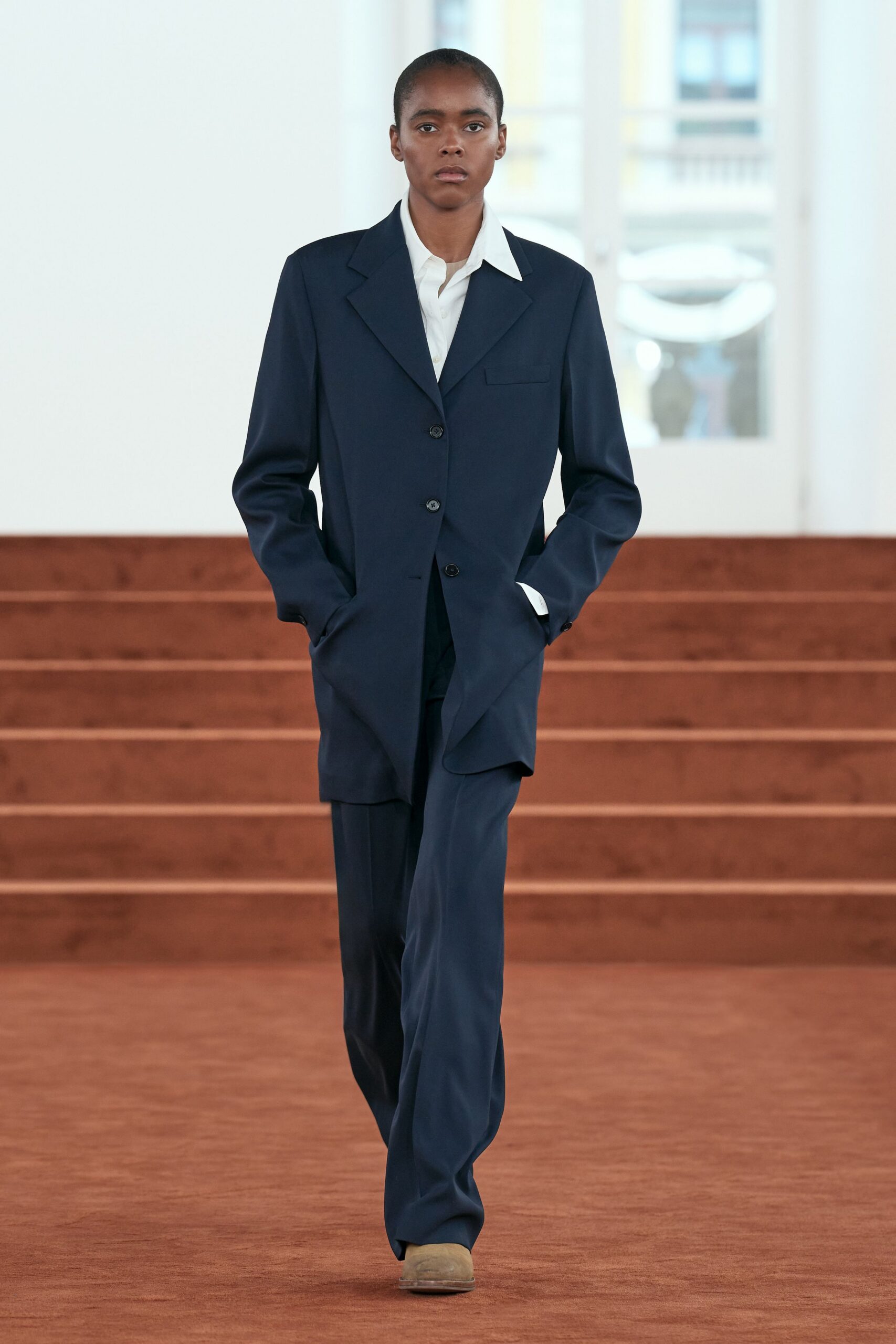 blue tailored suit with white shirt