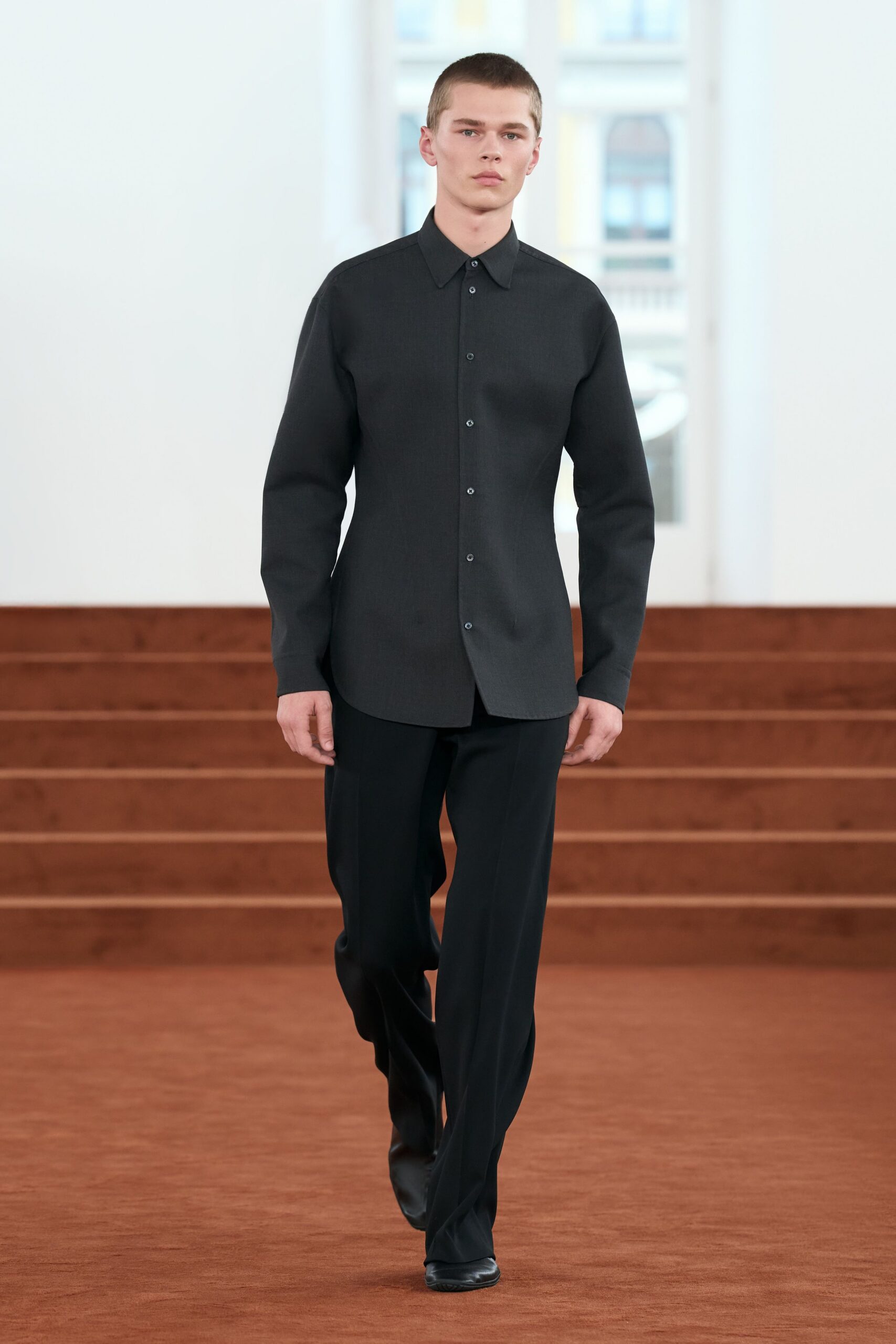 black fitted shirt and pants