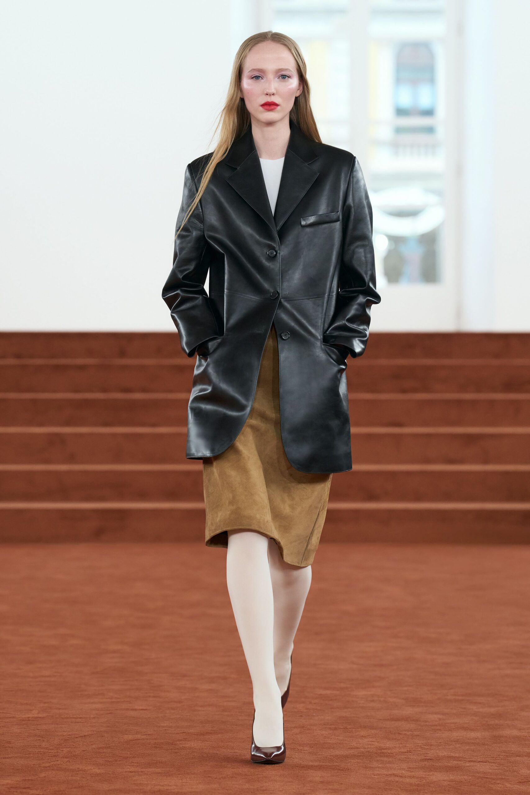 black leather long-sleeve collared structured blazer