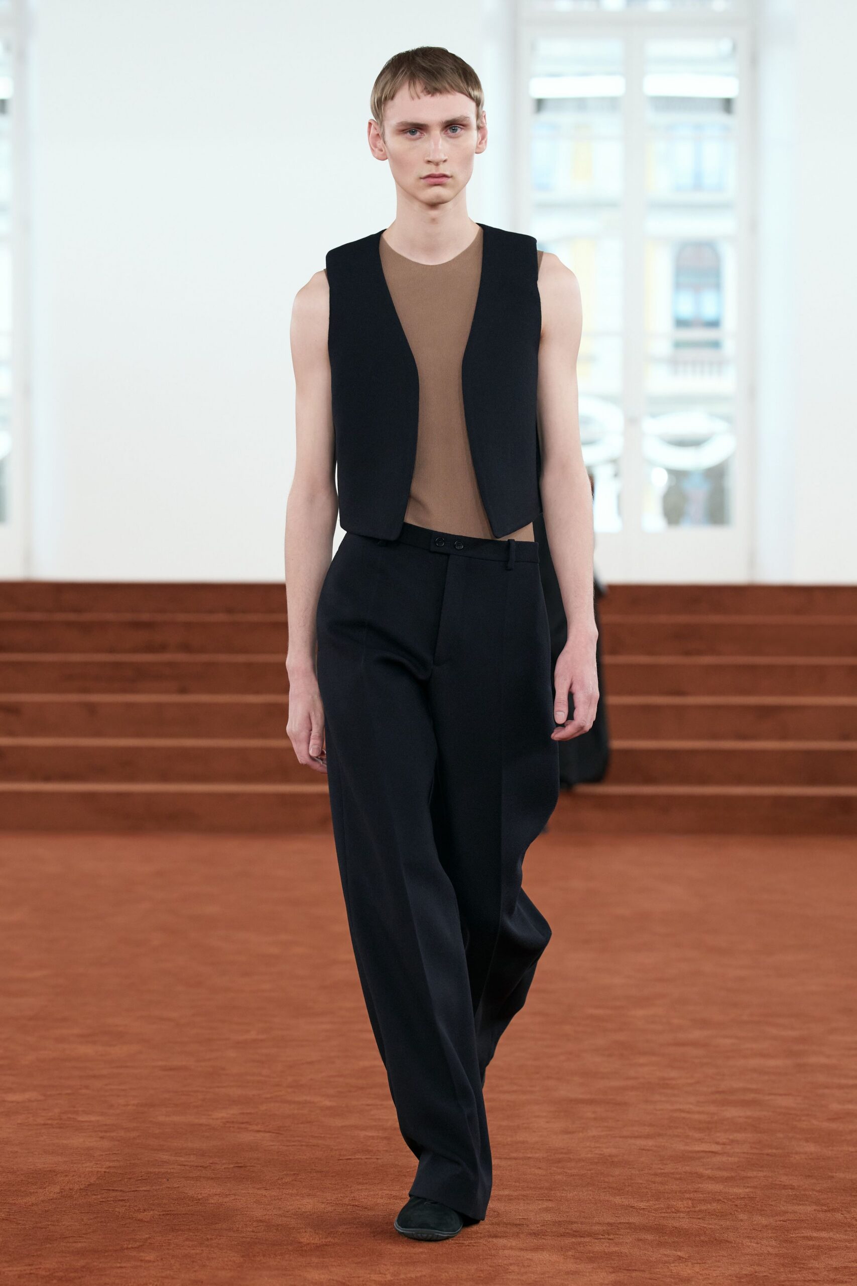 black vest brown top tailored pants