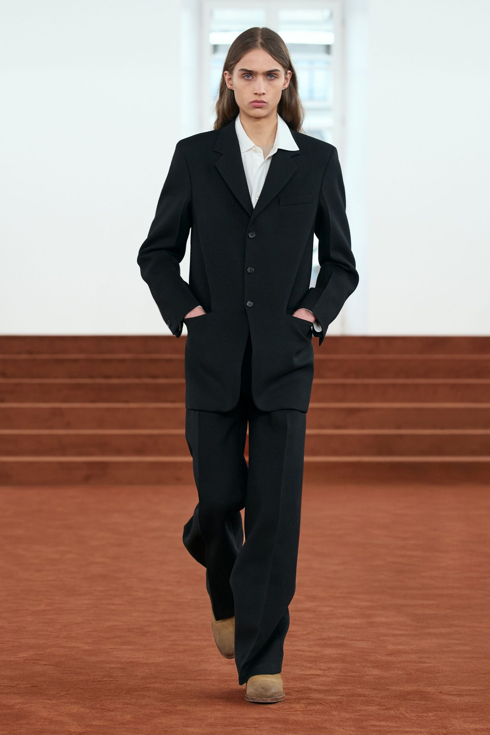 black tailored suit with white shirt