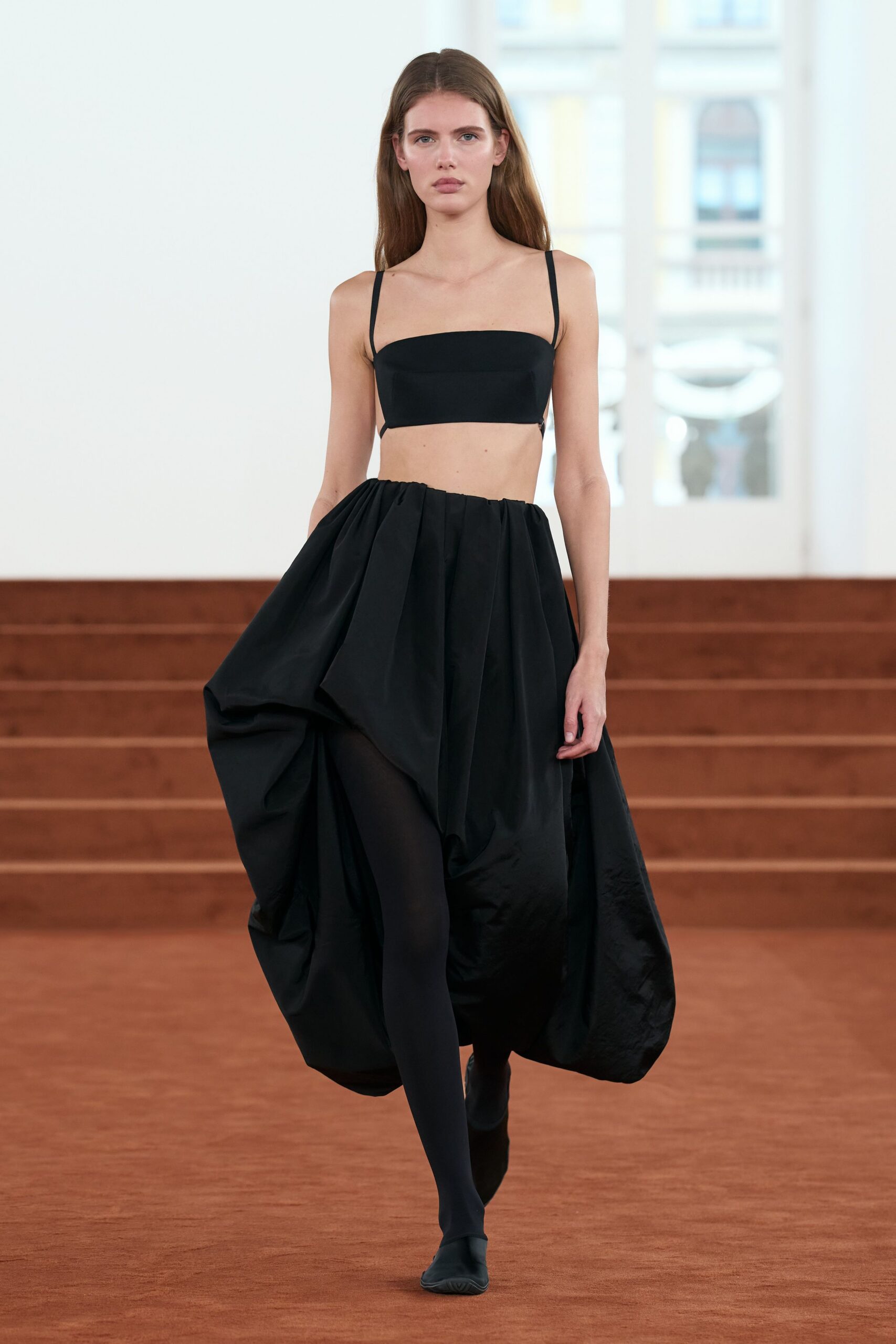 black silk asymmetric relaxed high-waisted pleated midi skirt