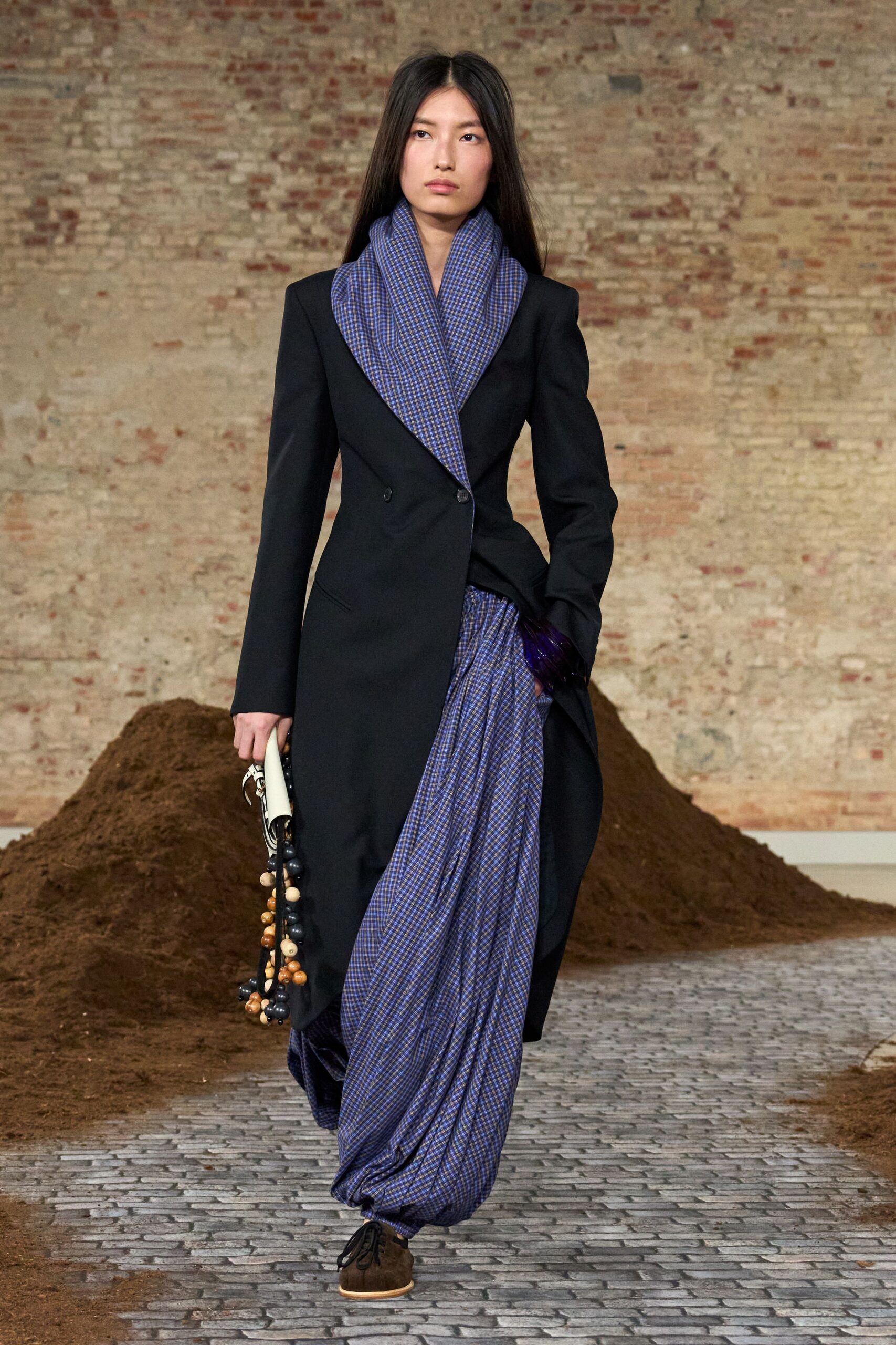 black wool long-sleeve collared tailored buttoned coat