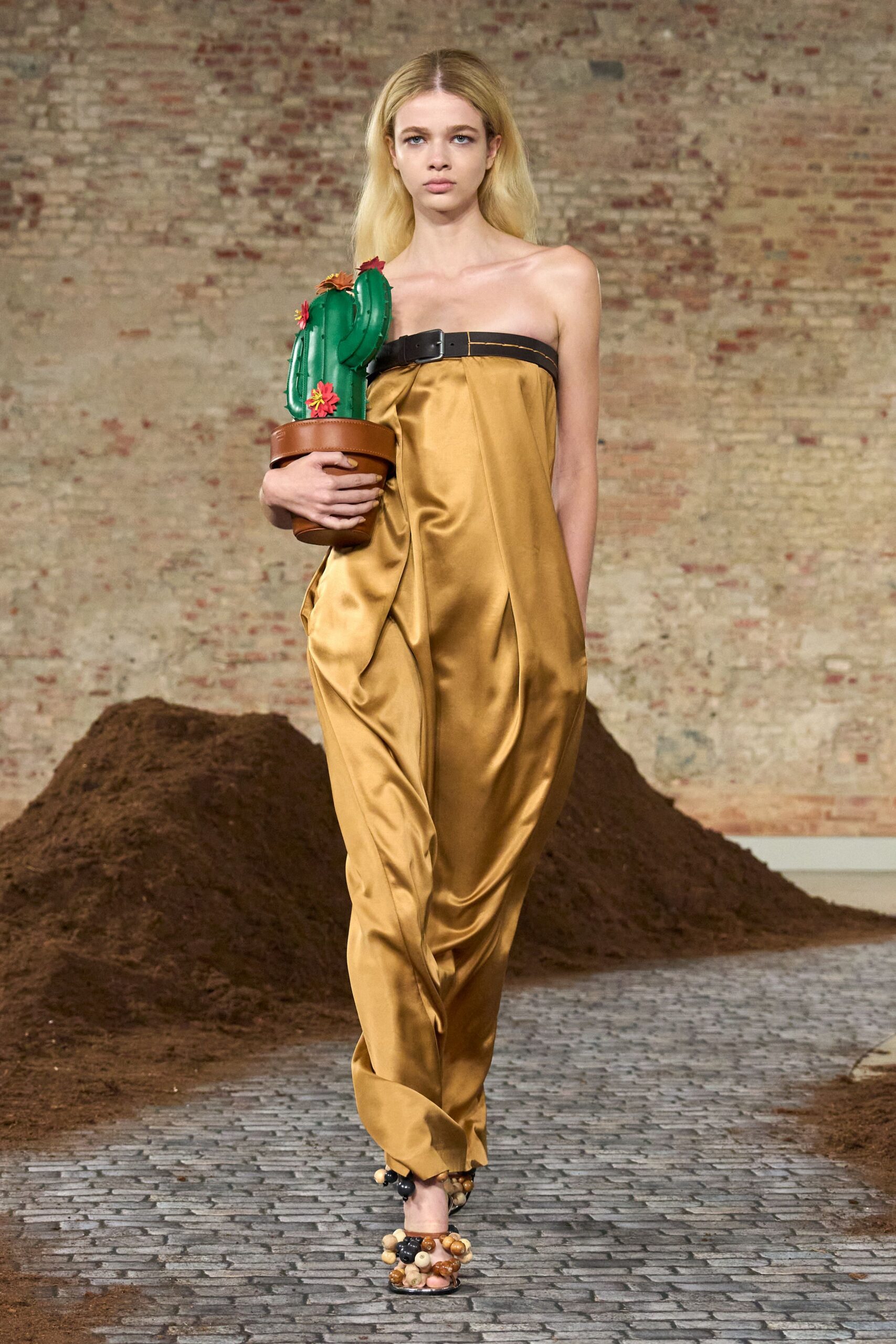 gold silk strapless dress with embellished shoes