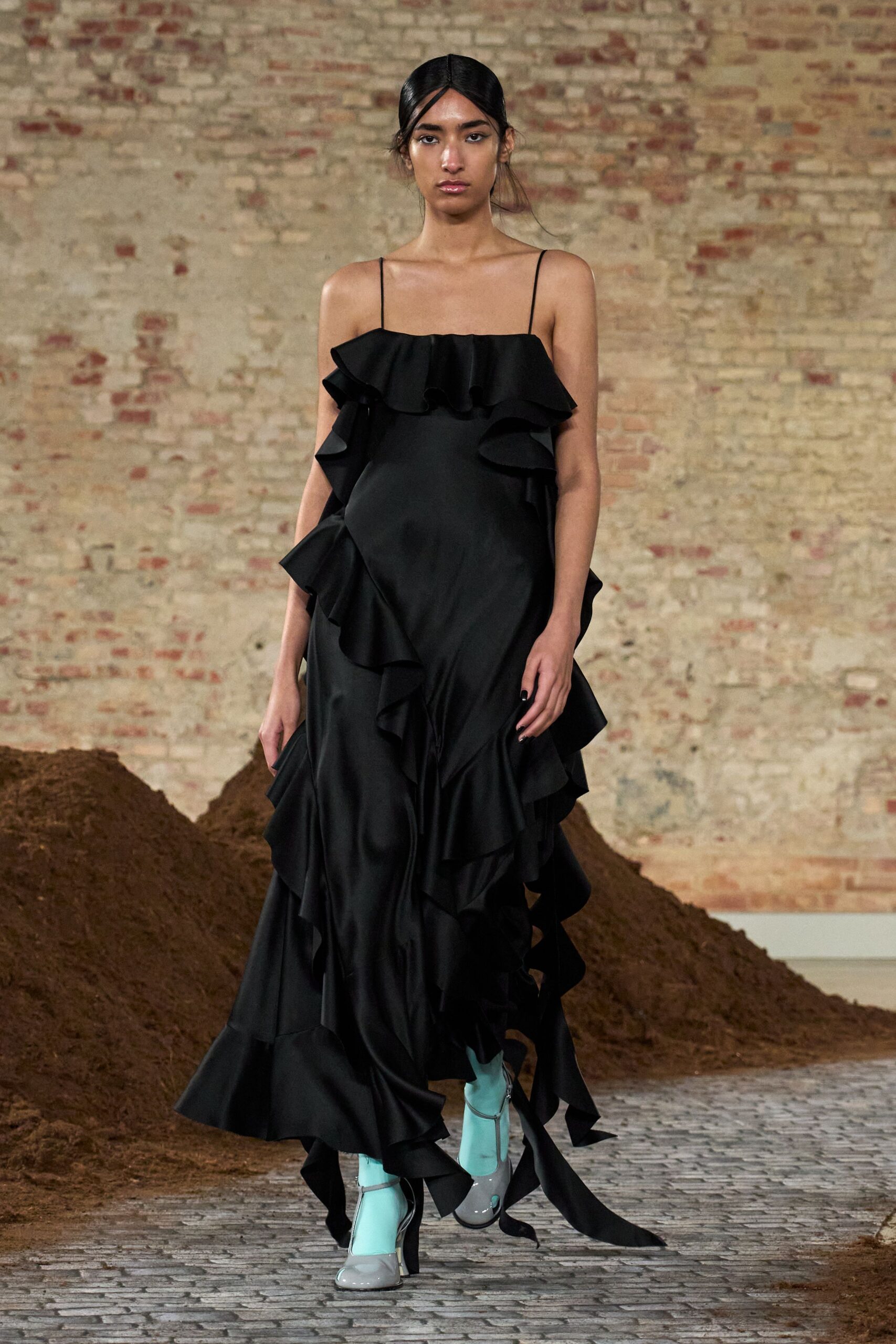 black ruffled midi dress with blue shoes